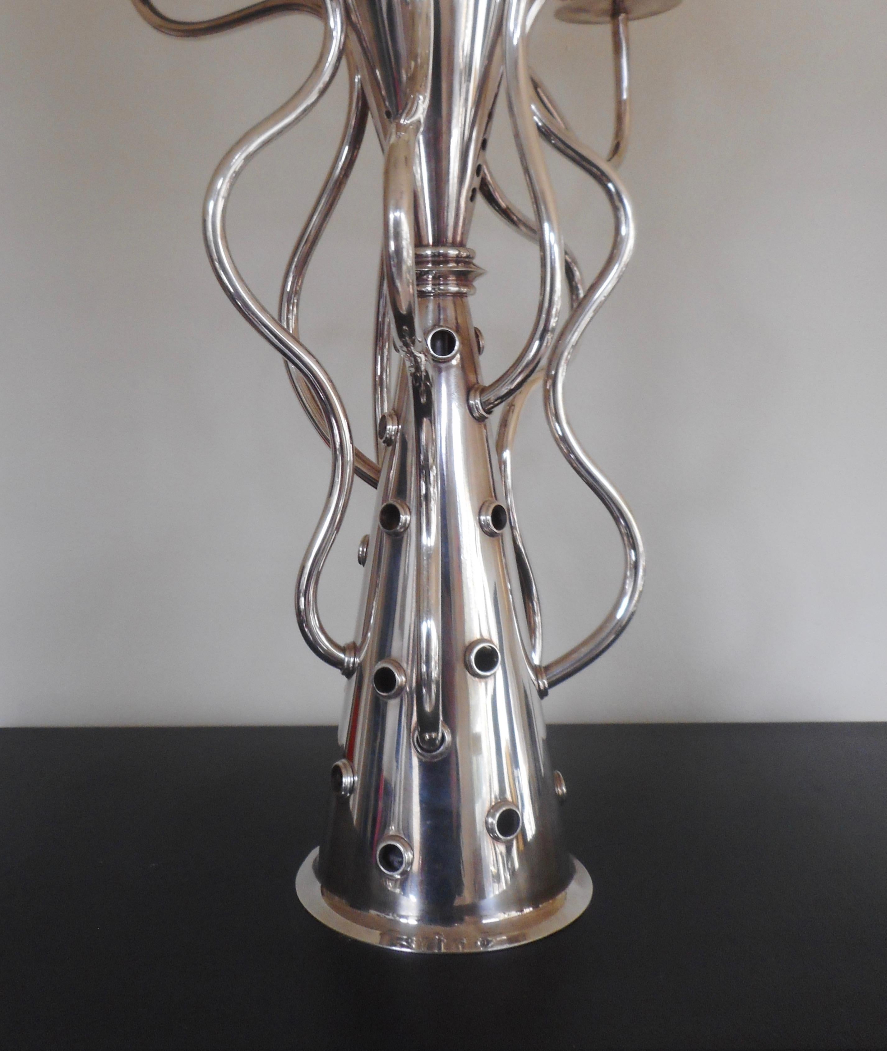 Designed in 1988 for Driade.
Seven arms, silver plated.
Stamped driadekosmo under the base.