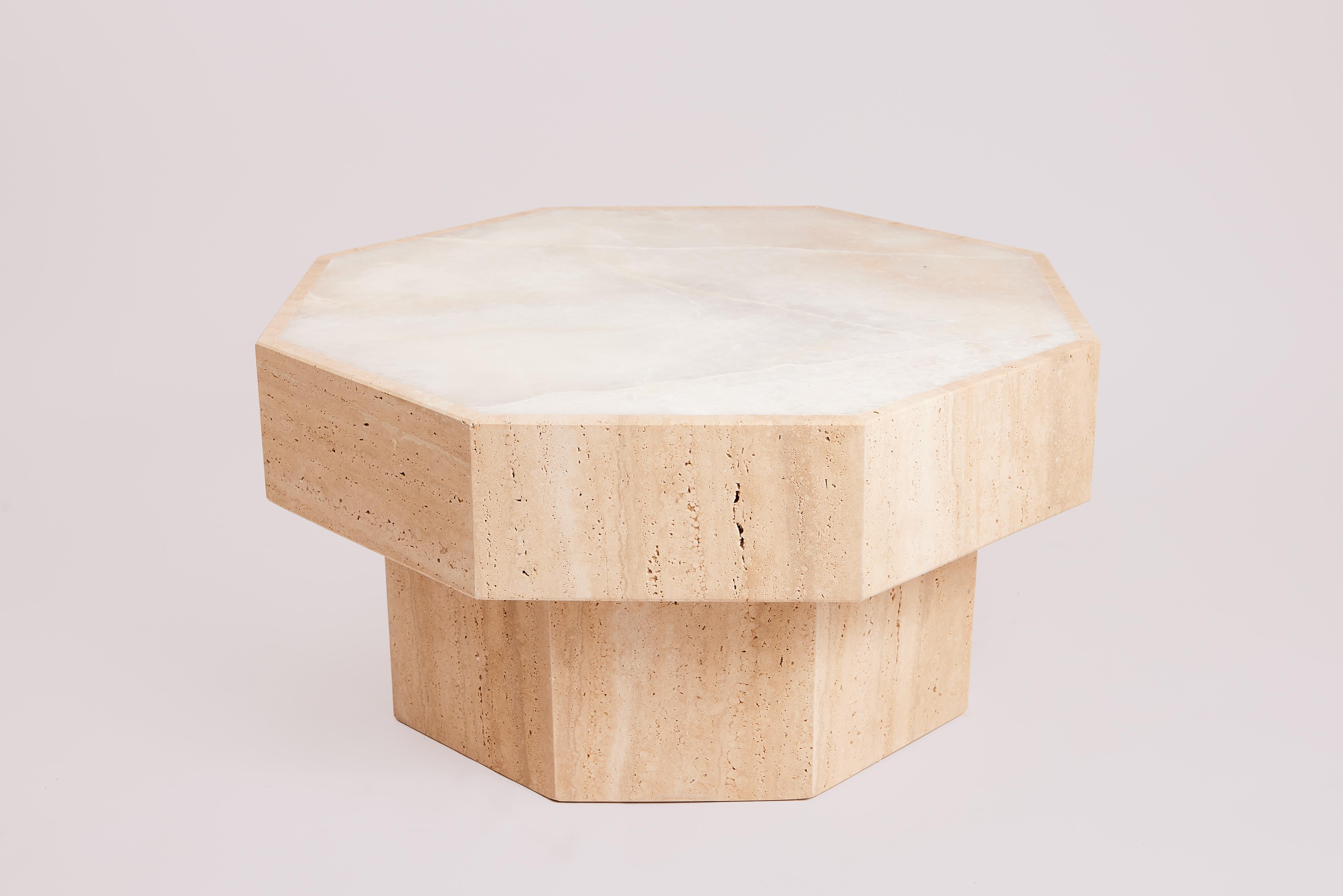 Simone Coffee Table by Studio Gaia Paris
Dimensions: ⌀ 80 x H 38 cm
Materials: White Onyx and Travertine.


The Simone coffee table, in onyx and travertine, features two types of natural stones known for their unique beauty and durable properties.