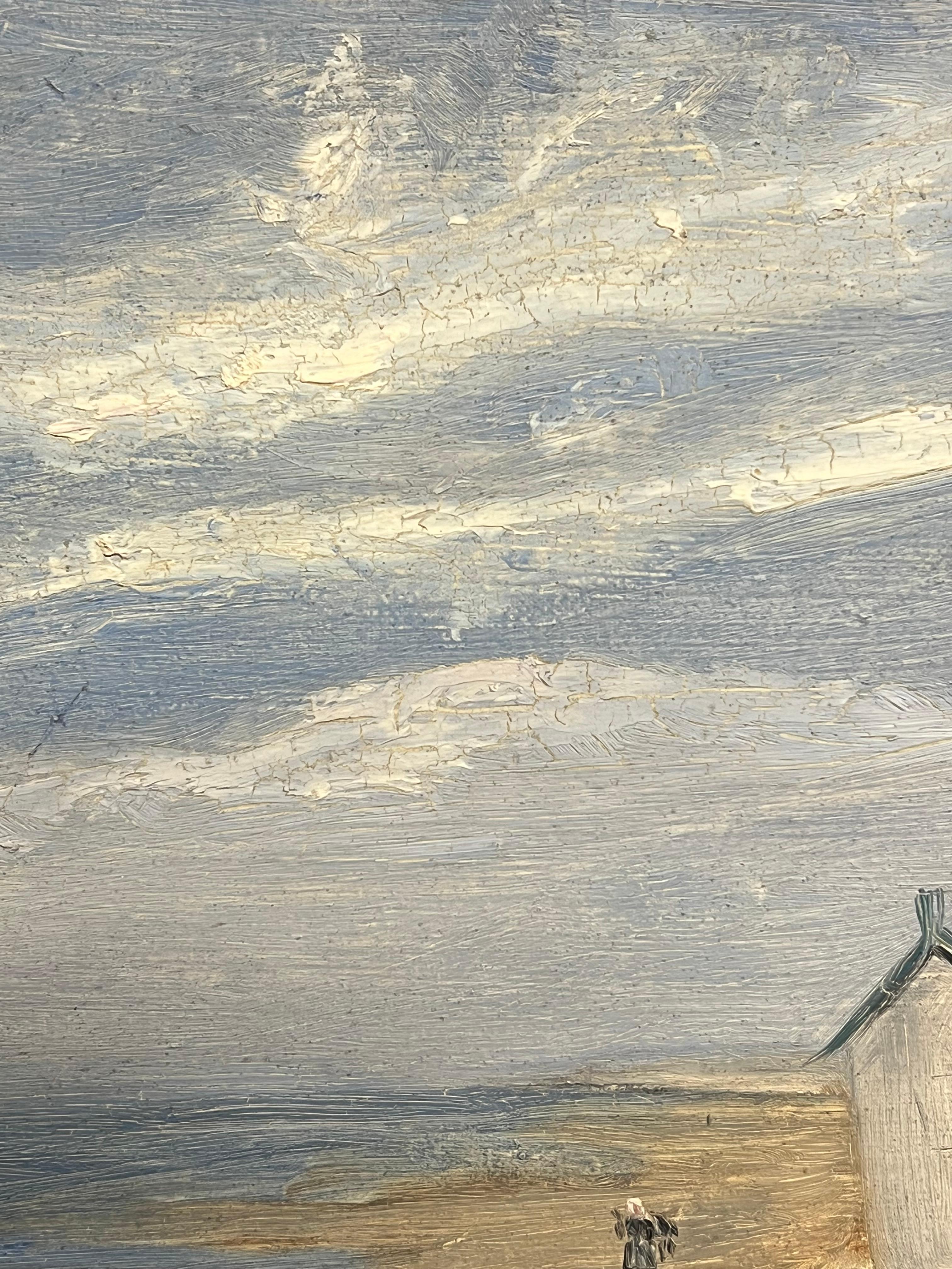 Beach Huts on a Tranquil Shore with Figures Relaxing under a Soft Blue Sky - Beige Landscape Painting by Simone Forge