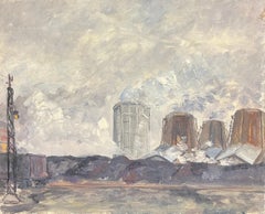 Paysage industriel avec fumeurs et tours de refroidissement sous un ciel nuageux