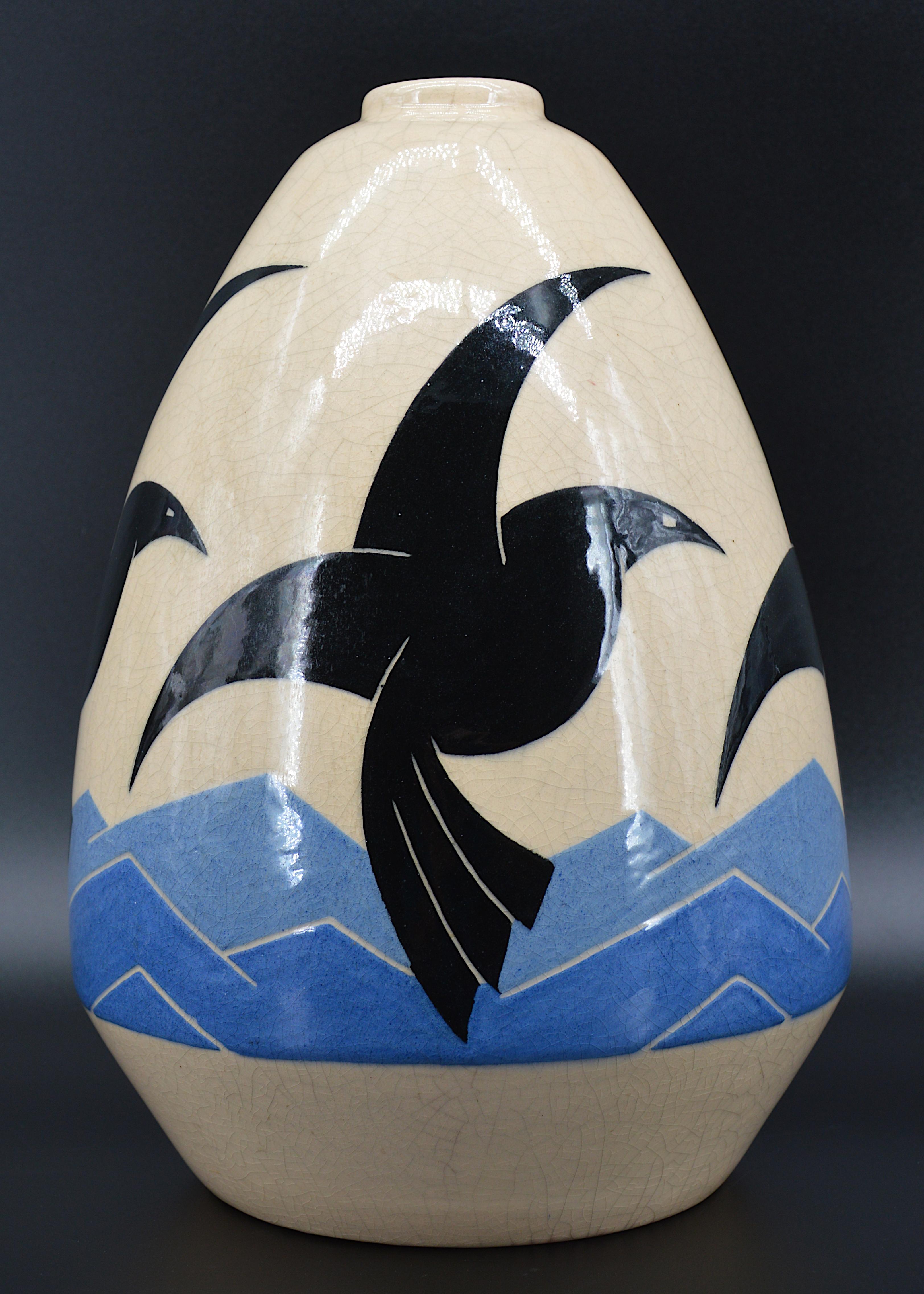 Museal large French Art Deco ceramic vase by Simone Larrieu, France, 1930s. Earthenware vase with ovoid body and ringed neck. Decorated with 4 stylized birds (seagulls) on a background of waves, black and blue enamel on a cracked beige background.