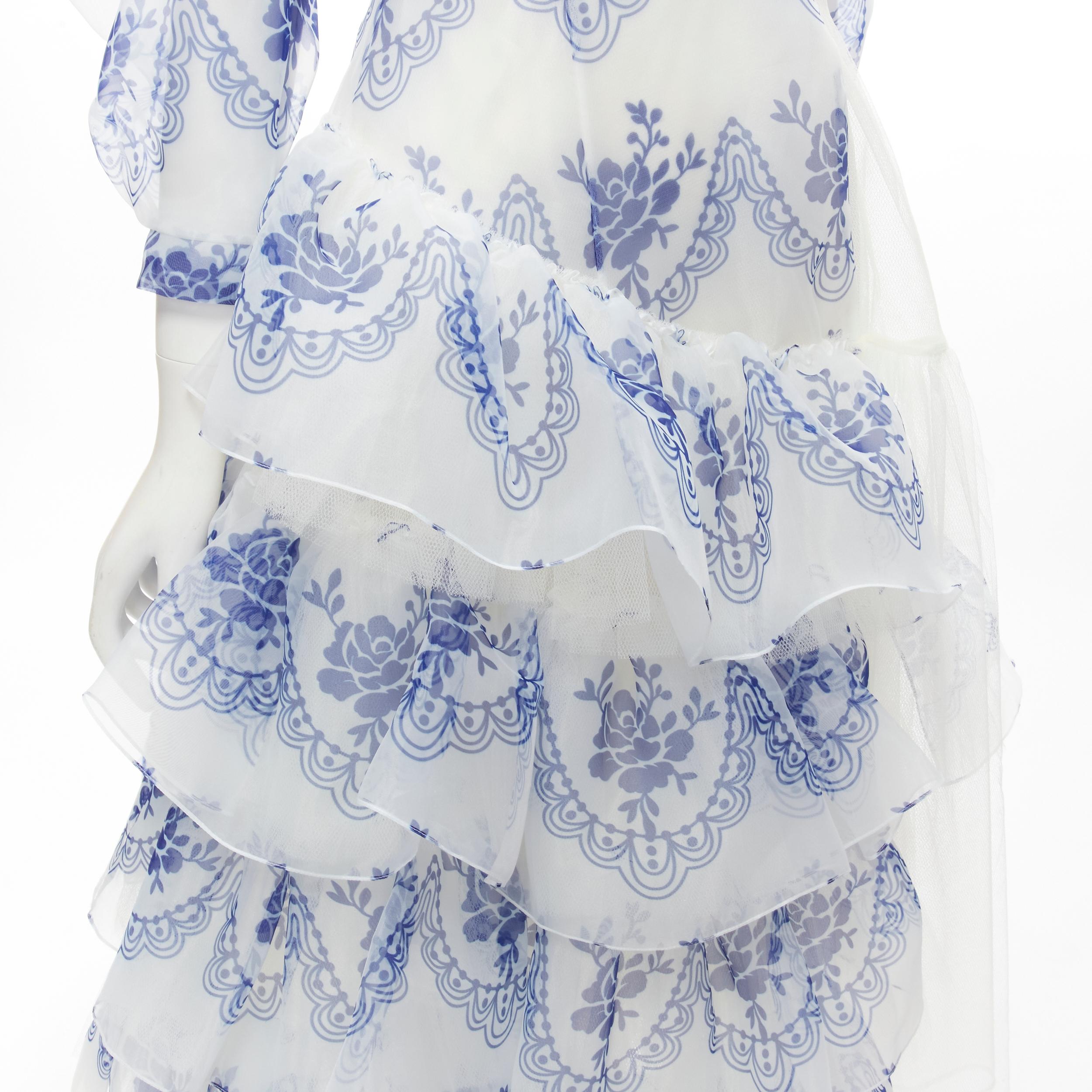 SIMONE ROCHA 2020 Runway Delft Wrengirl white blue tulle tiered dress UK6 XS
Brand: Simone Rocha
Collection: Spring Summer 2020 Runway
Material: Polyester
Color: White
Pattern: Floral
Closure: Zip
Extra Detail: Dropped shoulder puff sleeves. Dropped
