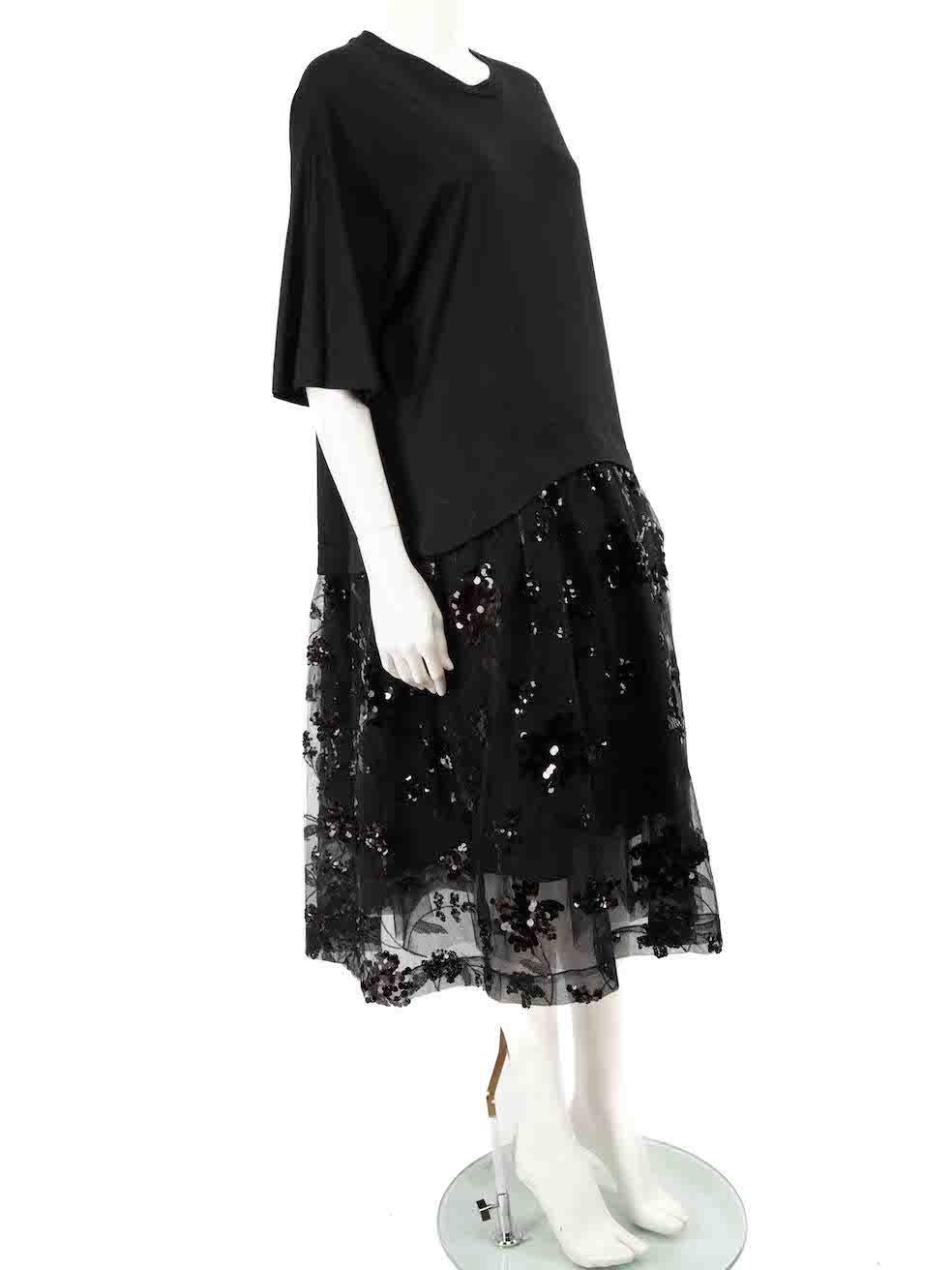 CONDITION is Very good. Minimal wear to dress is evident. Minimal wear to neckline with small discolouration on this used Simone Rocha designer resale item.
 
 
 
 Details
 
 
 Black
 
 Cotton
 
 Dress
 
 Short sleeves
 
 Midi
 
 Floral sequin