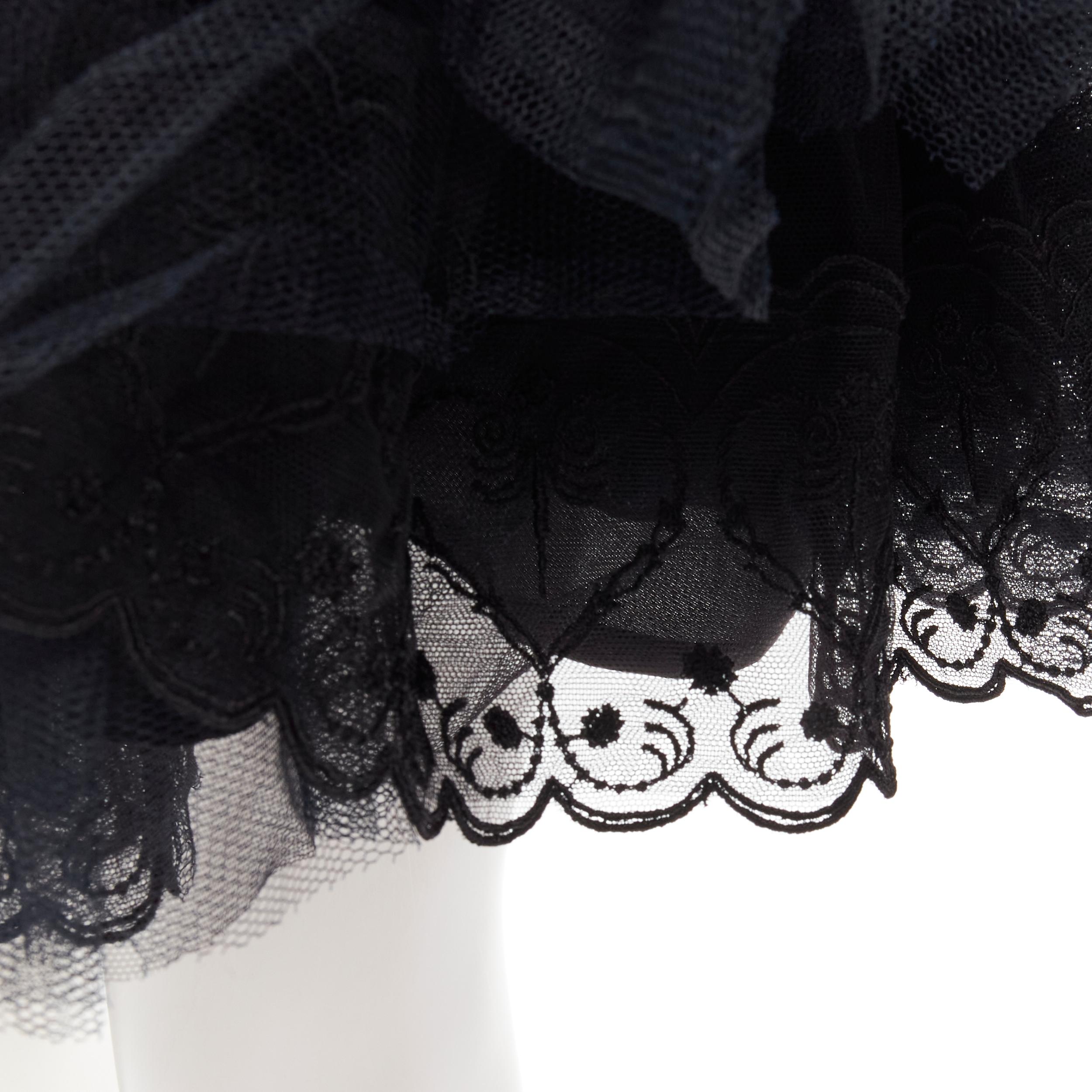 SIMONE ROCHA black shirred ruffle gathered tulle flared skirt UK4 XS
Brand: Simone Rocha
Material: Polyester
Color: Black
Pattern: Solid
Closure: Elasticated
Made in: Portugal

CONDITION:
Condition: Excellent, this item was pre-owned and is in