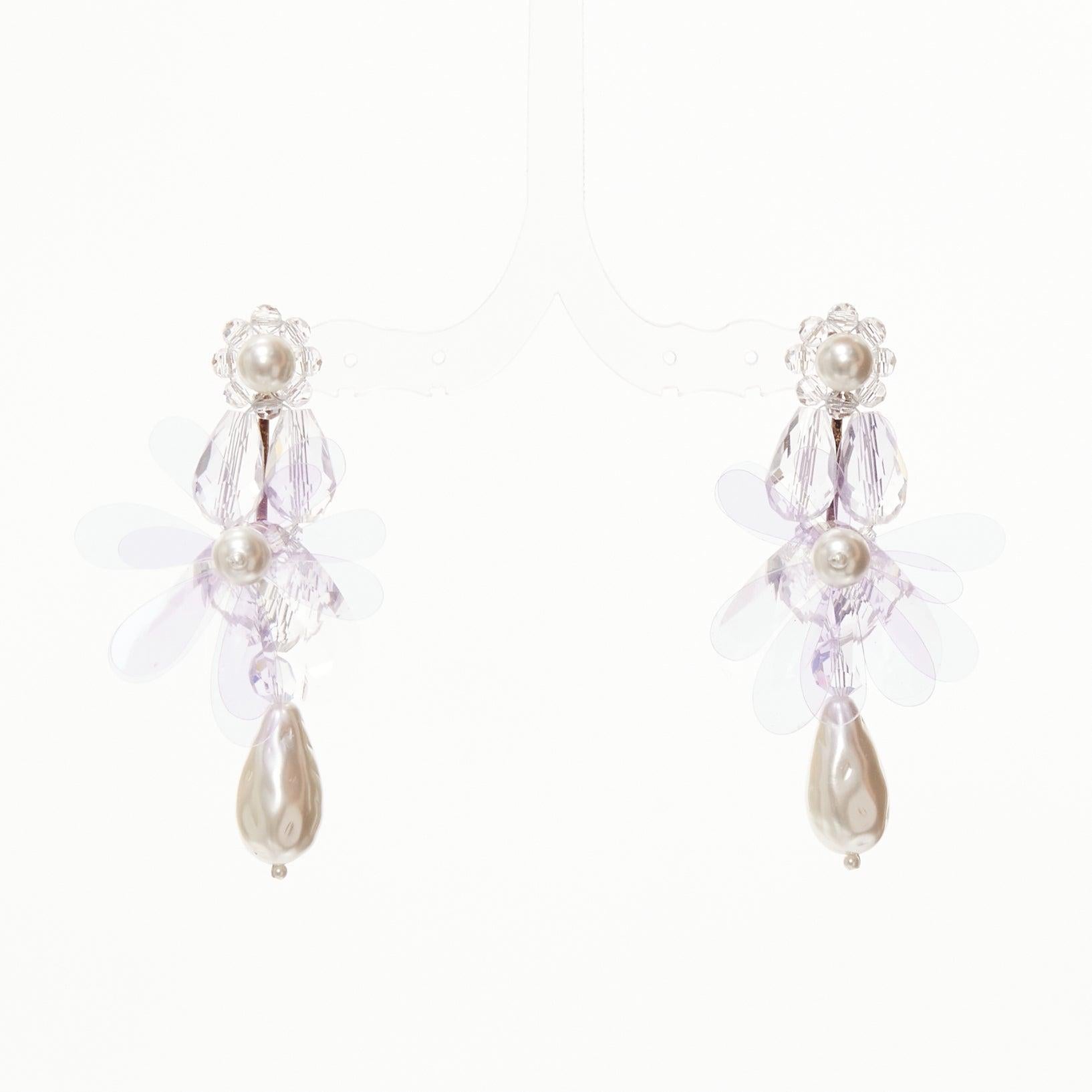 SIMONE ROCHA lilac purple plastic flower drop faux pearl pin earrings
Reference: AAWC/A01238
Brand: Simone Rocha
Material: Plastic, Faux Pearl
Color: Purple, Pearl
Pattern: Floral
Closure: Pin
Lining: Gold Metal
Extra Details: Logo