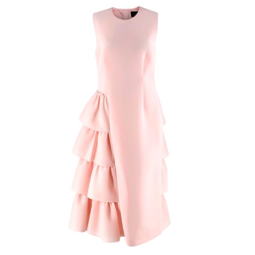 Simone Rocha Pink Neoprene Asymmetrical Ruffled Dress

-Made of soft Neoprene 
-Beautiful light pink hue 
-Ruffled details to the skirt, asymmetrical to the front 
-Fully lined
-Round neckline 
-Zip fastening to the back
-Elegant timeless design