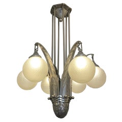 Simonet Frères Paris, circa 1930. Silver-plated and lacquered bronze.