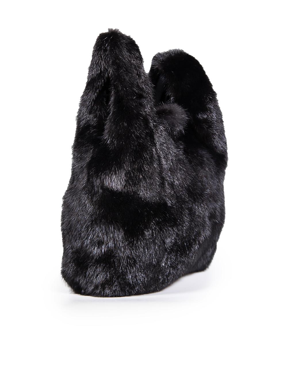 CONDITION is Very good. Minimal wear to the bag is evident. Light marks on the inside base of the bag on this used Furrissima designer resale item.
 
 Details
 
 
 Black 
 
 Mink 
 
 Bag 
 
 2x Top handles 
 
 Style
 
 1x Main compartment
 
 1x Slip