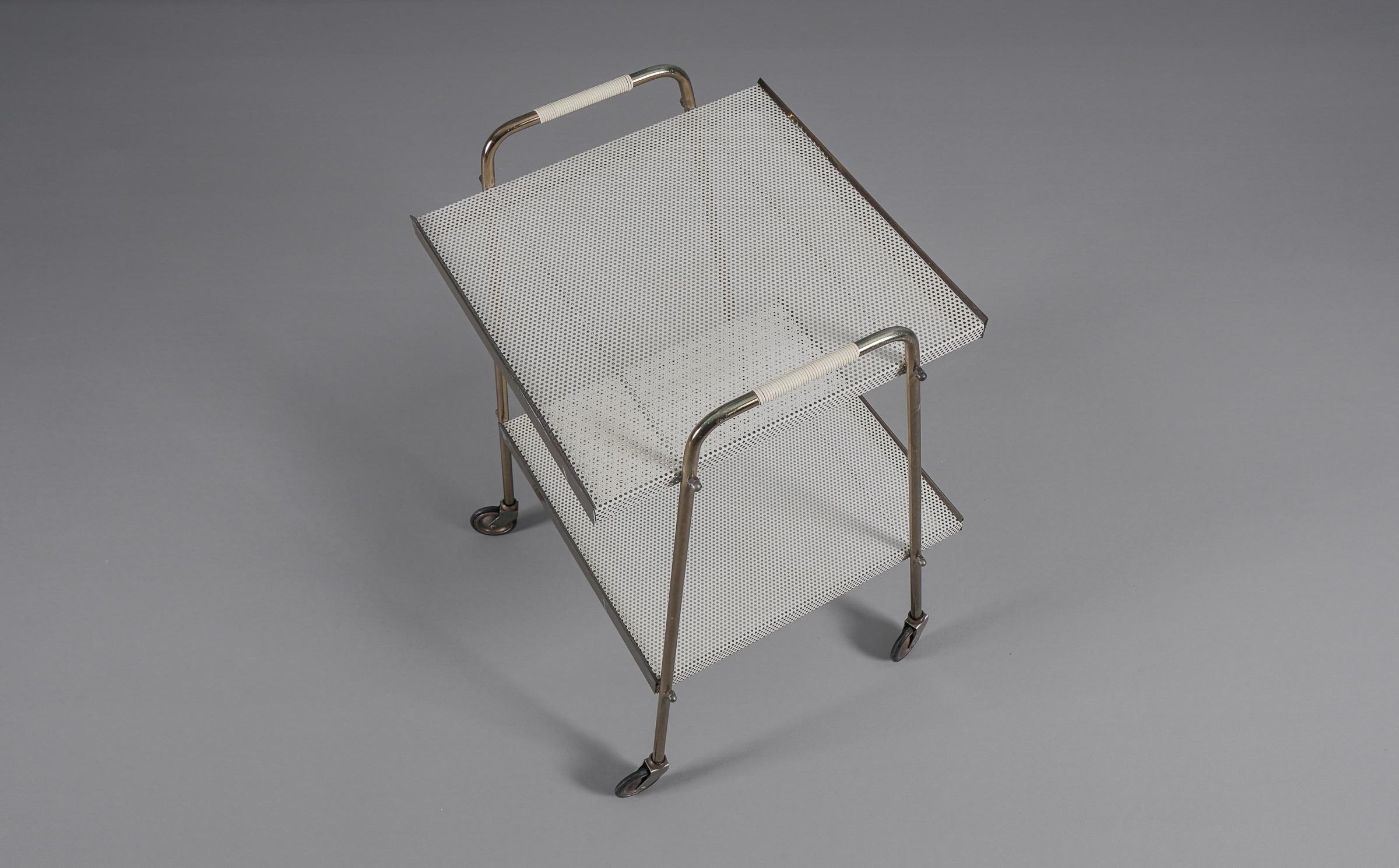 Simple and elegant brass and perforated metal bar cart in the manner of Mathieu  1