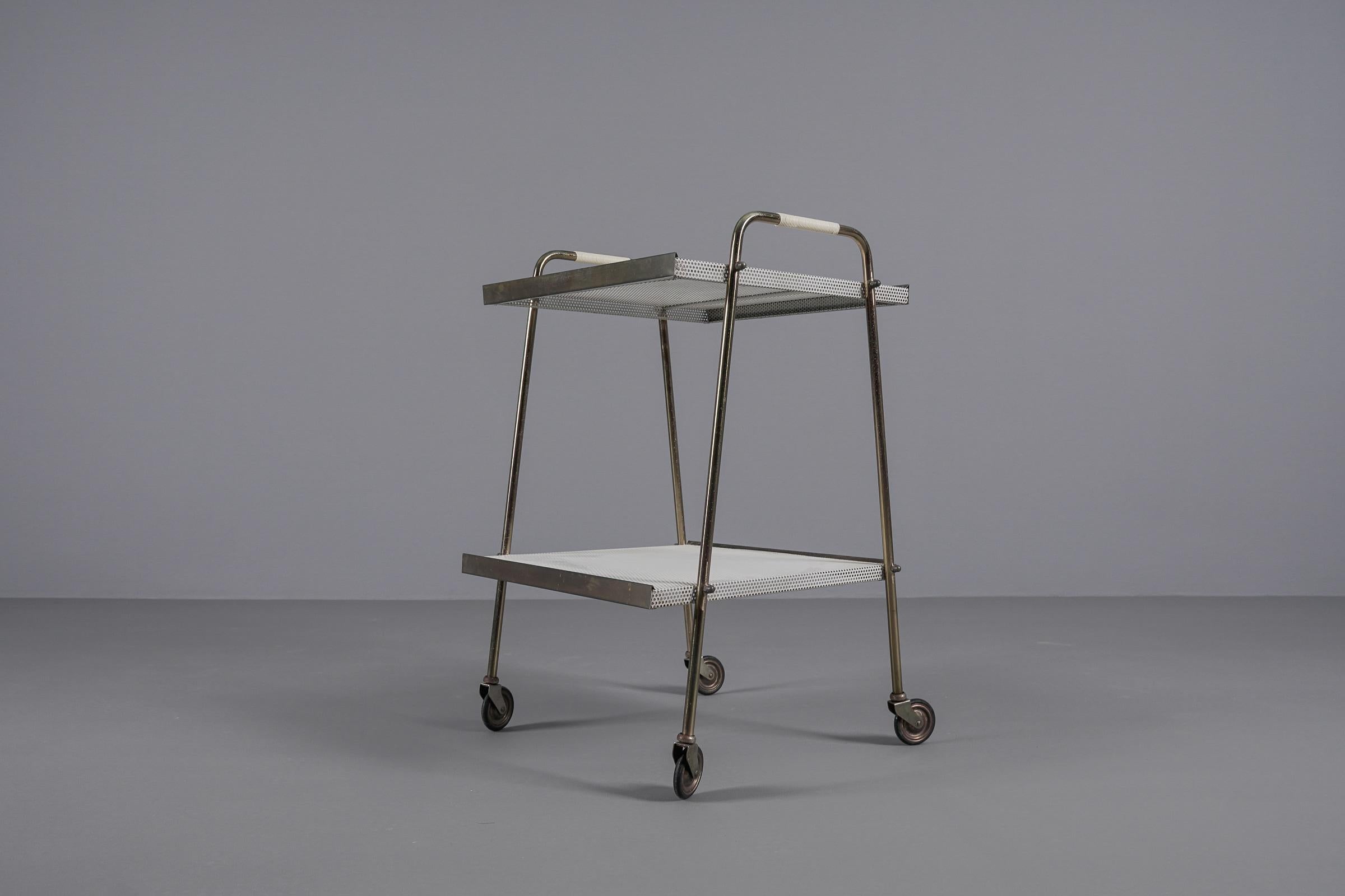 Mid-Century Modern Simple and elegant brass and perforated metal bar cart in the manner of Mathieu 