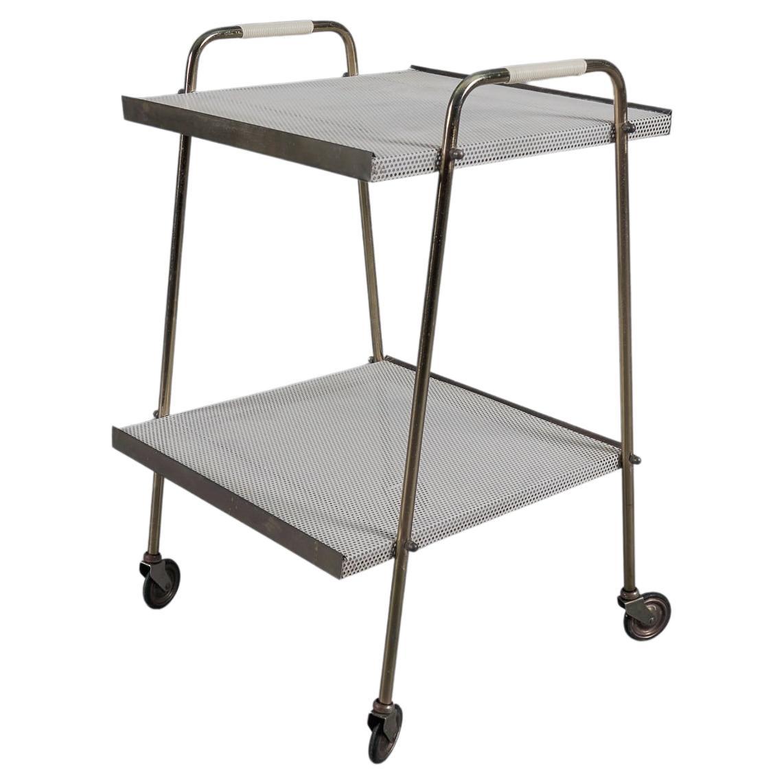 Simple and elegant brass and perforated metal bar cart in the manner of Mathieu 