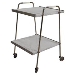 Simple and elegant brass and perforated metal bar cart in the manner of Mathieu