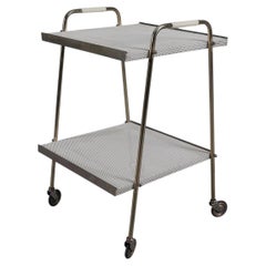 Simple and elegant brass and perforated metal bar cart in the manner of Mathieu 