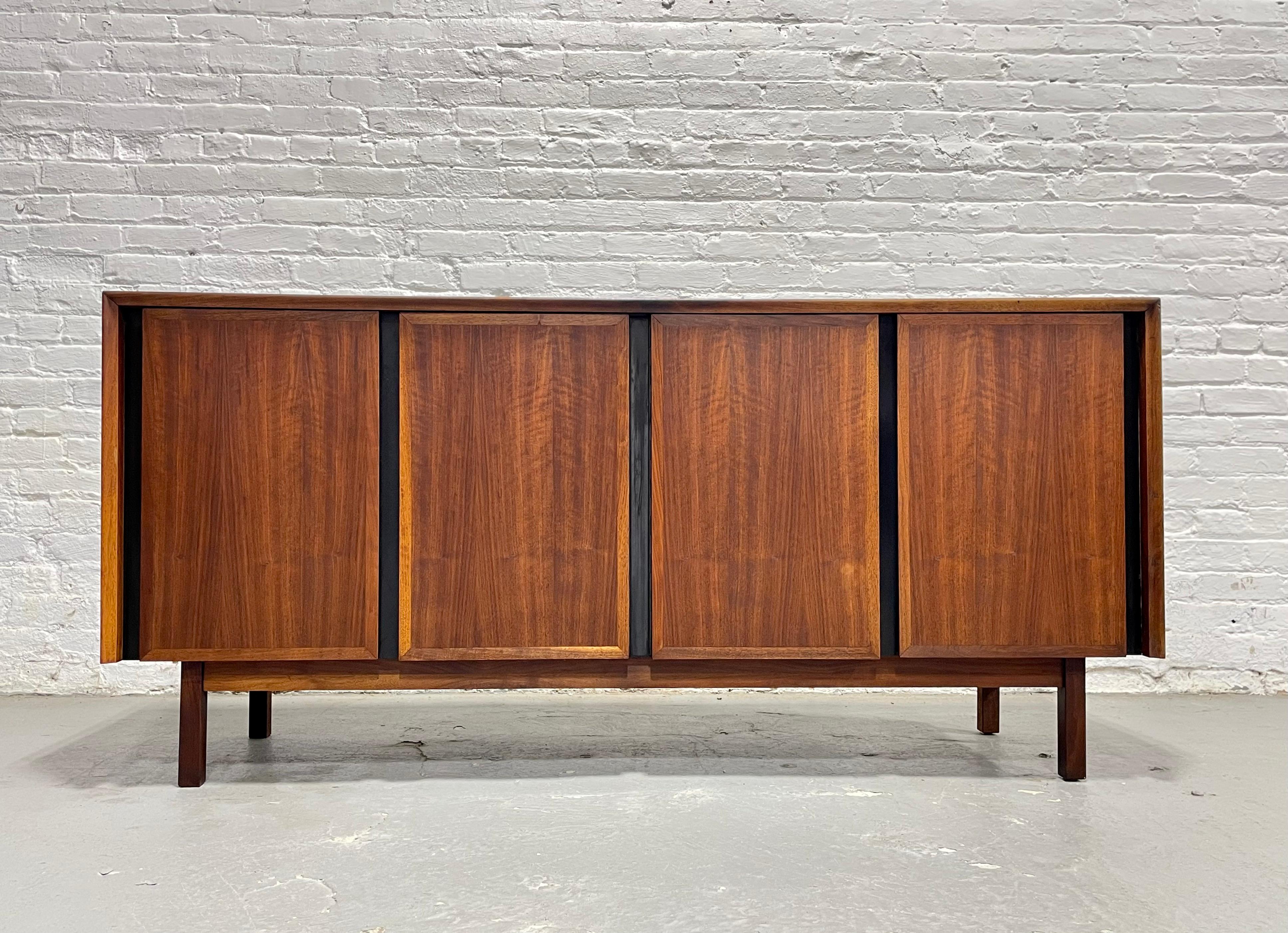 Simple, classic + perfect Mid Century Modern Walnut Credenza / Media Stand by Dillingham, c. 1960's. This perfectly classic credenza features a simple  front panel design and is constructed of walnut with the most gorgeous wood grains, contrasted by