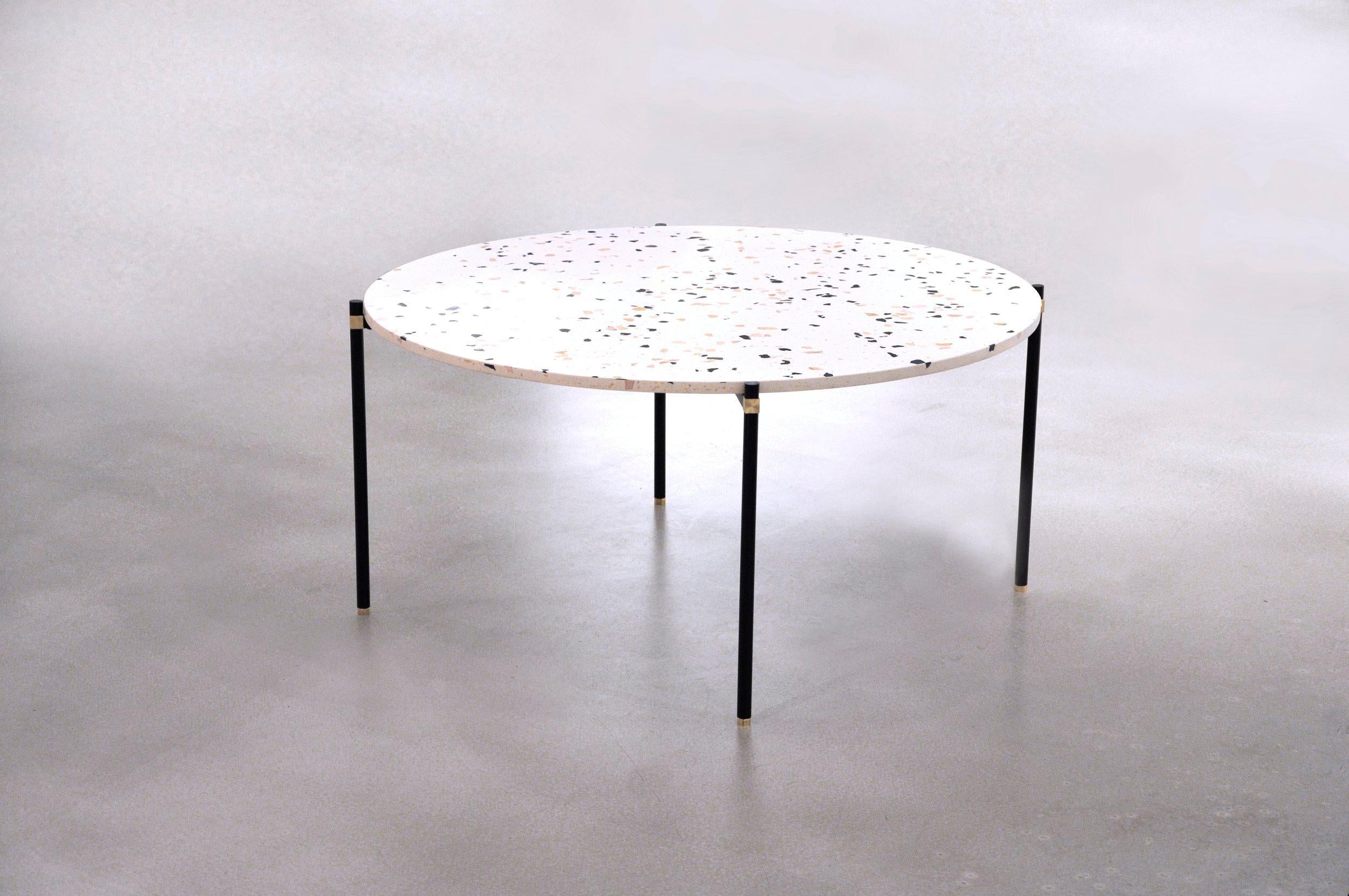 Simple coffee table 100 4 legs by Contain
Dimensions: D 100 x H 51 cm 
Materials: Iron, brass, Terrazzo, marble, stone.
Available in different finishes and dimensions.

The Connector furniture collection is based on single assembly pieces that