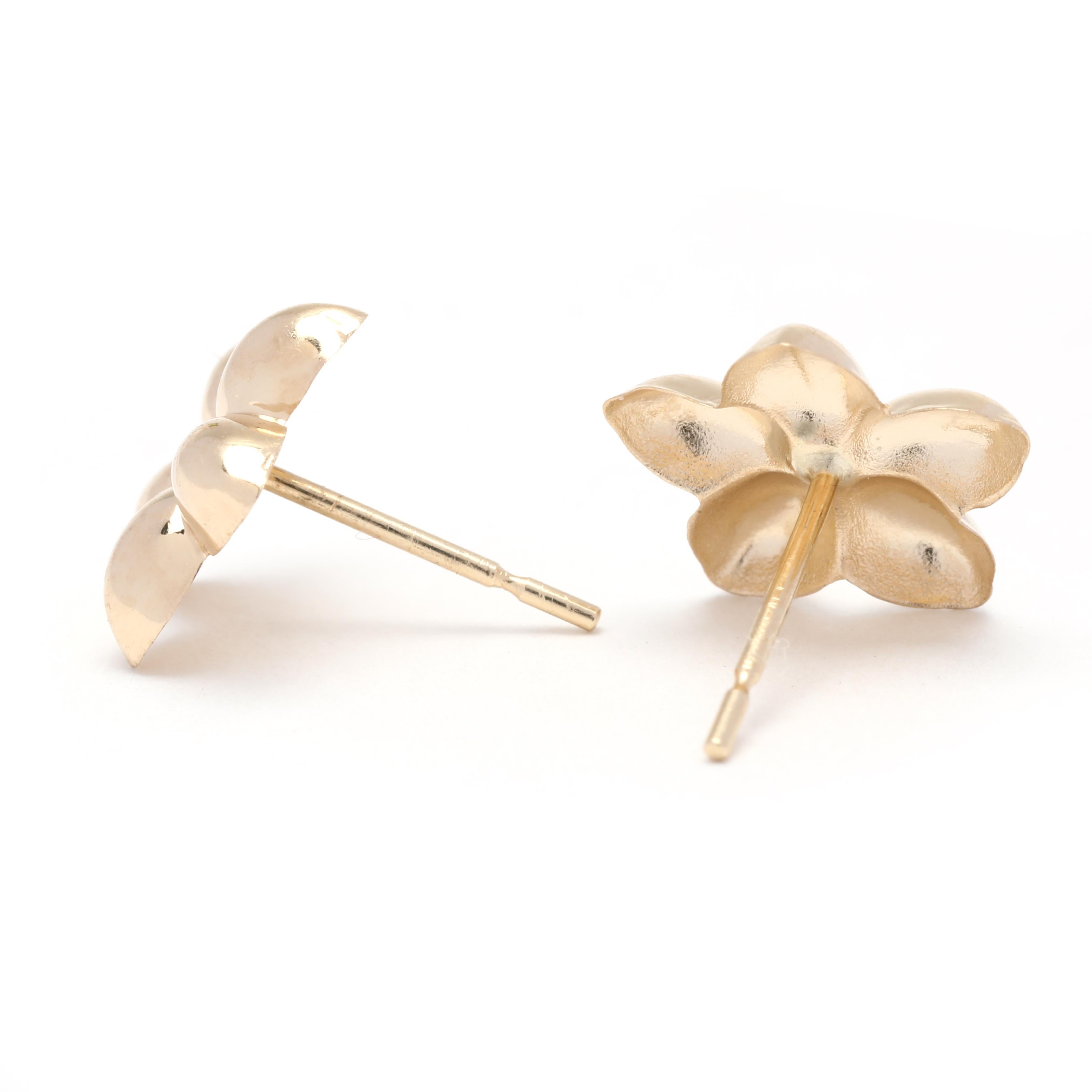 These beautiful 14K yellow gold flower stud earrings are perfect for everyday wear. The petite size is perfect for the minimalist look, while the light weight ensures comfortable wear. These simple yet elegant stud earrings measure 3/8 inches in
