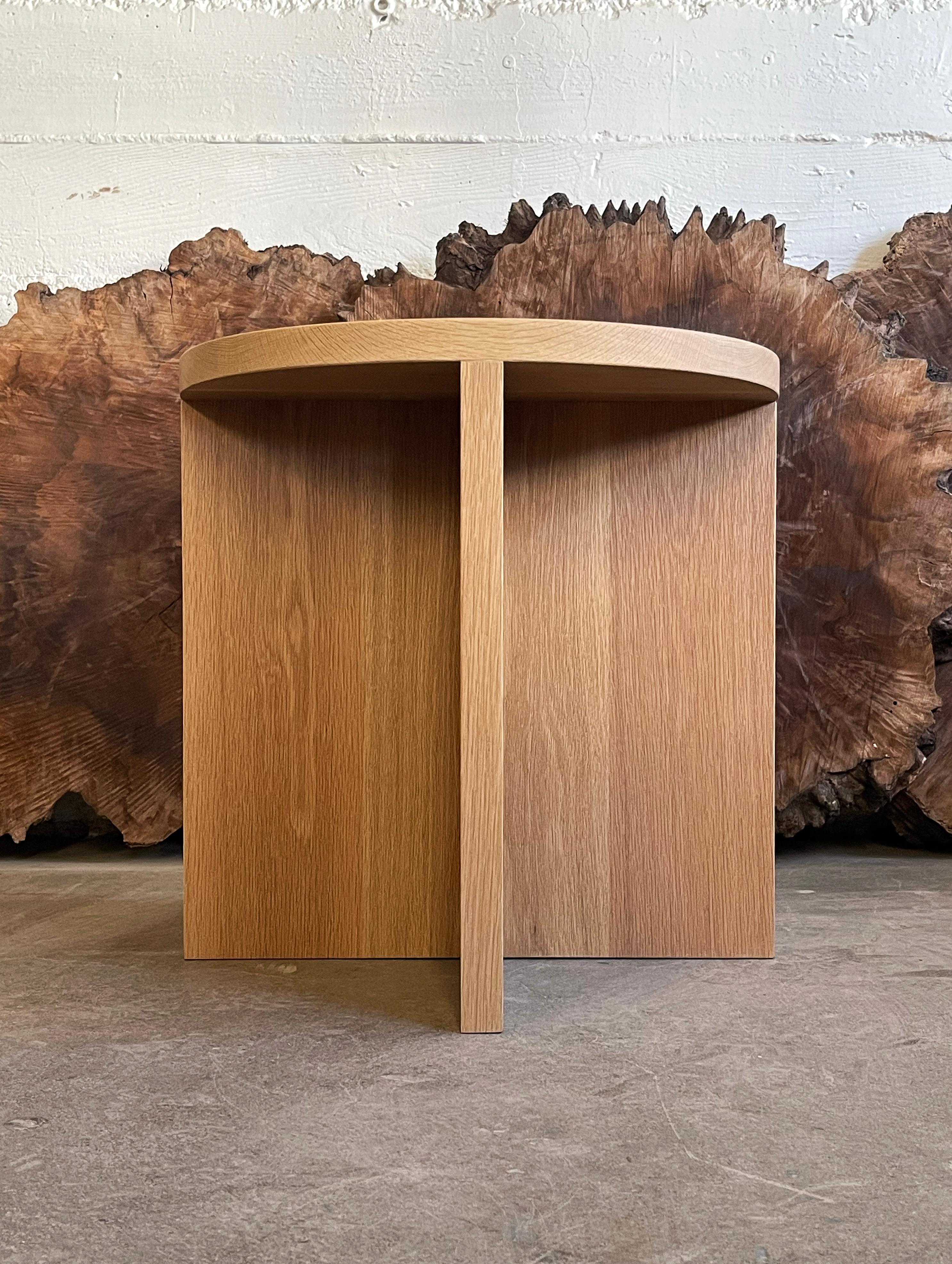 Solid oak side table in white oak with round top measuring 21