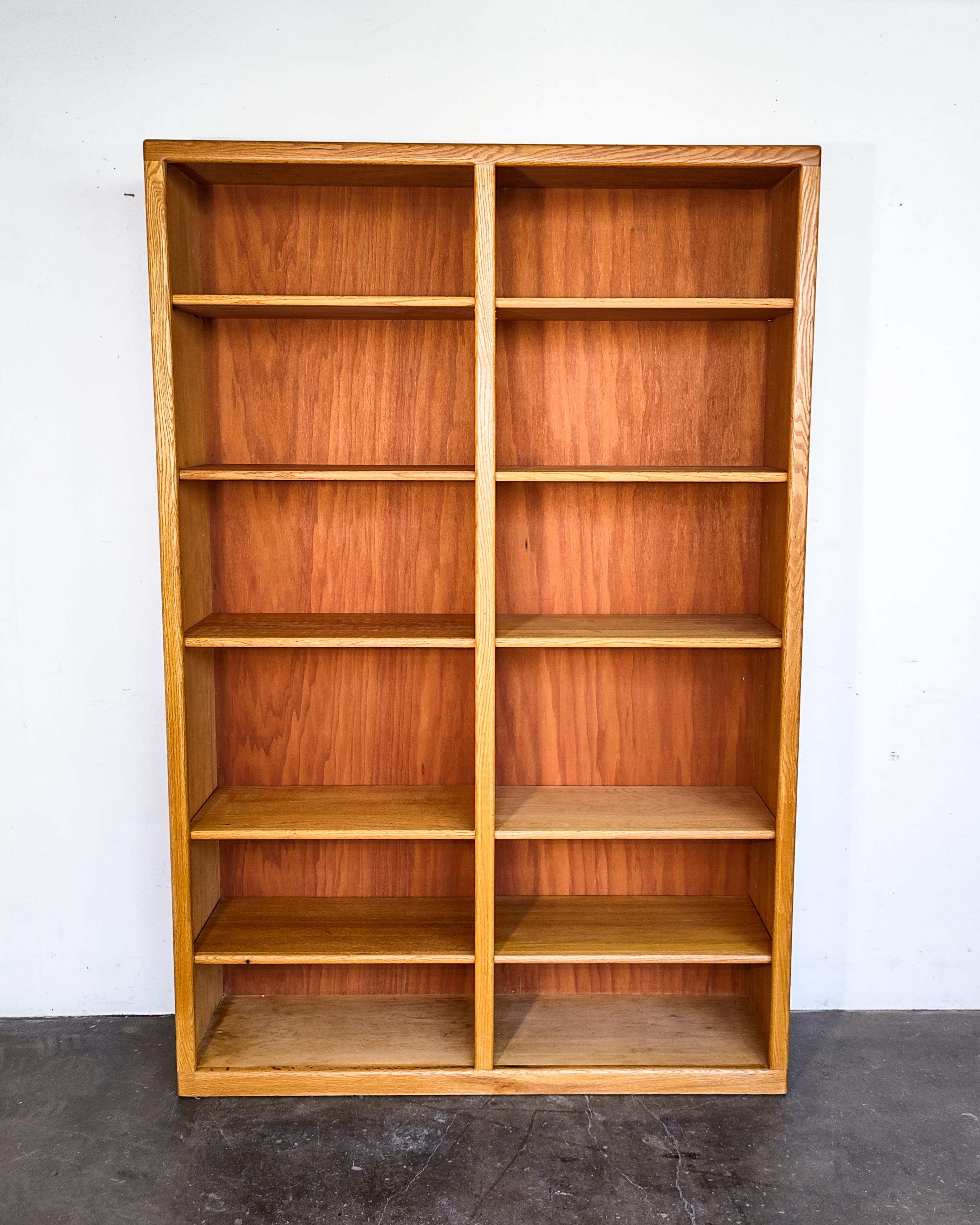 Minimal oak wood double bookshelf with adjustable shelves. Sturdy construction with detailed joinery and rounded edges.

Measures: 72