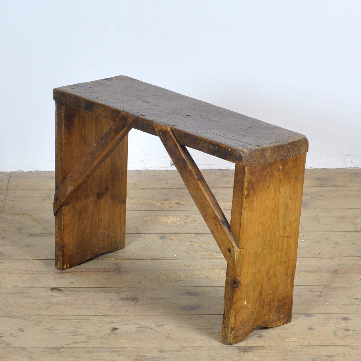Simple stool made of pine wood, circa 1930. The wood has a beautiful patina. 