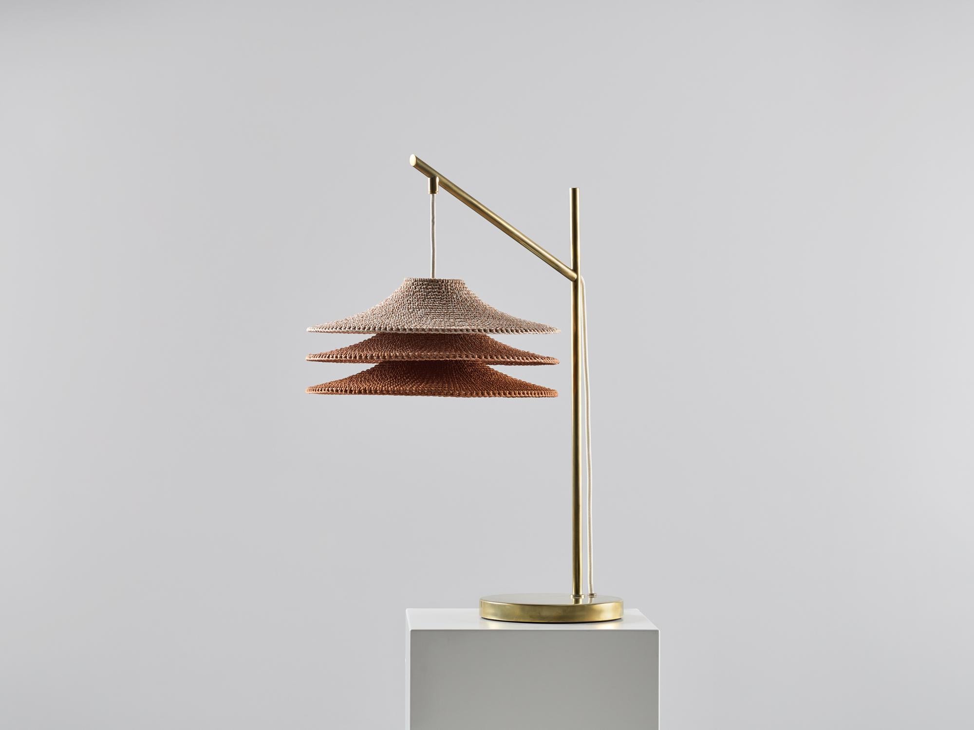 Simple shade 03 table lamp by Naomi Paul
Dimensions: D 30 x W 43 x H 57 cm
Materials: Metal frame, Egyptian cotton cord.
Colors: Ombré finish in Ecru and Rust.
Available in other colors.
Available in plain, 50/50, trim or ombré color