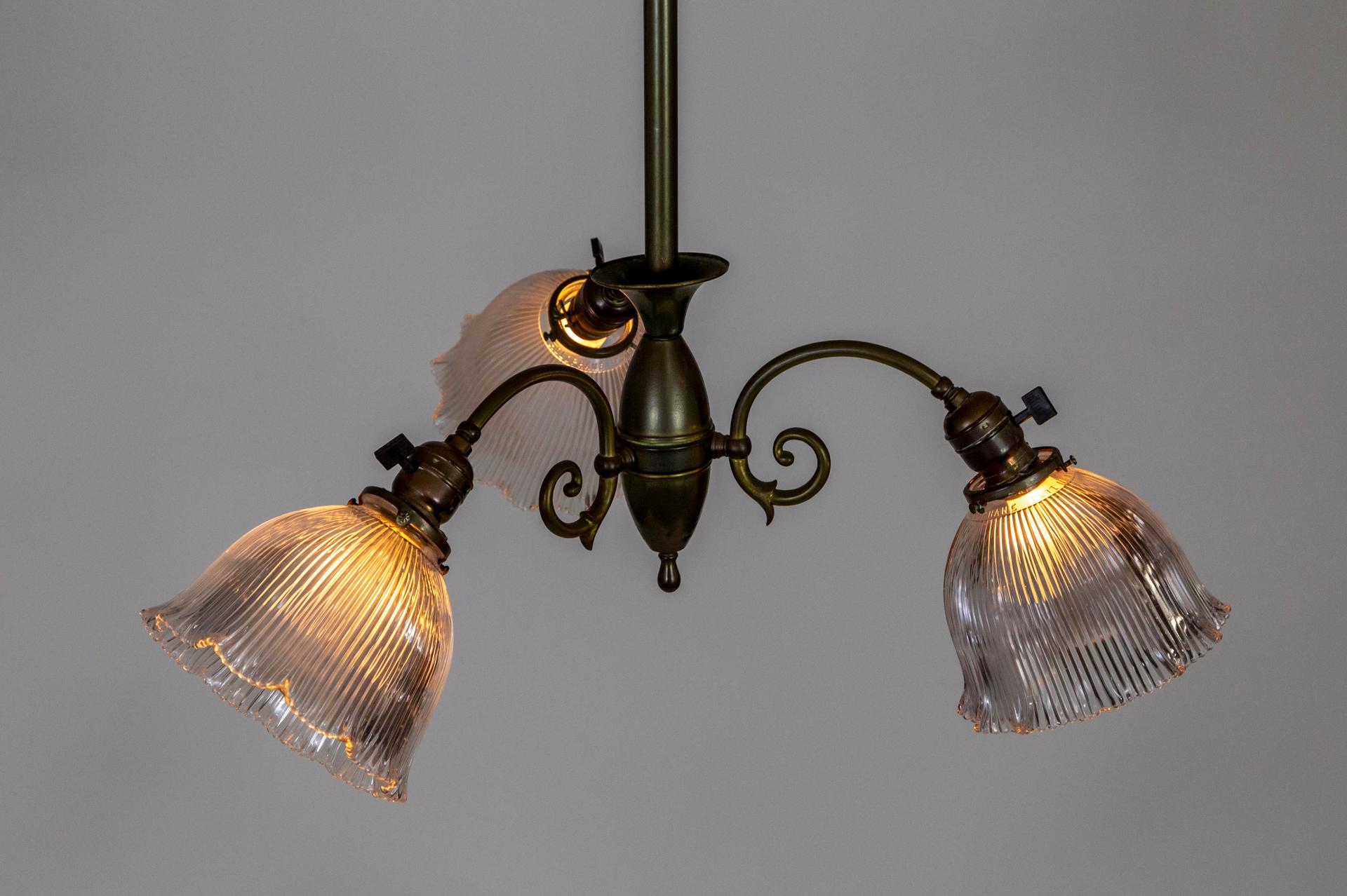 Late 19th Century Simple Victorian Brass Chandelier w/ Ruffled Holophane Glass Shades For Sale