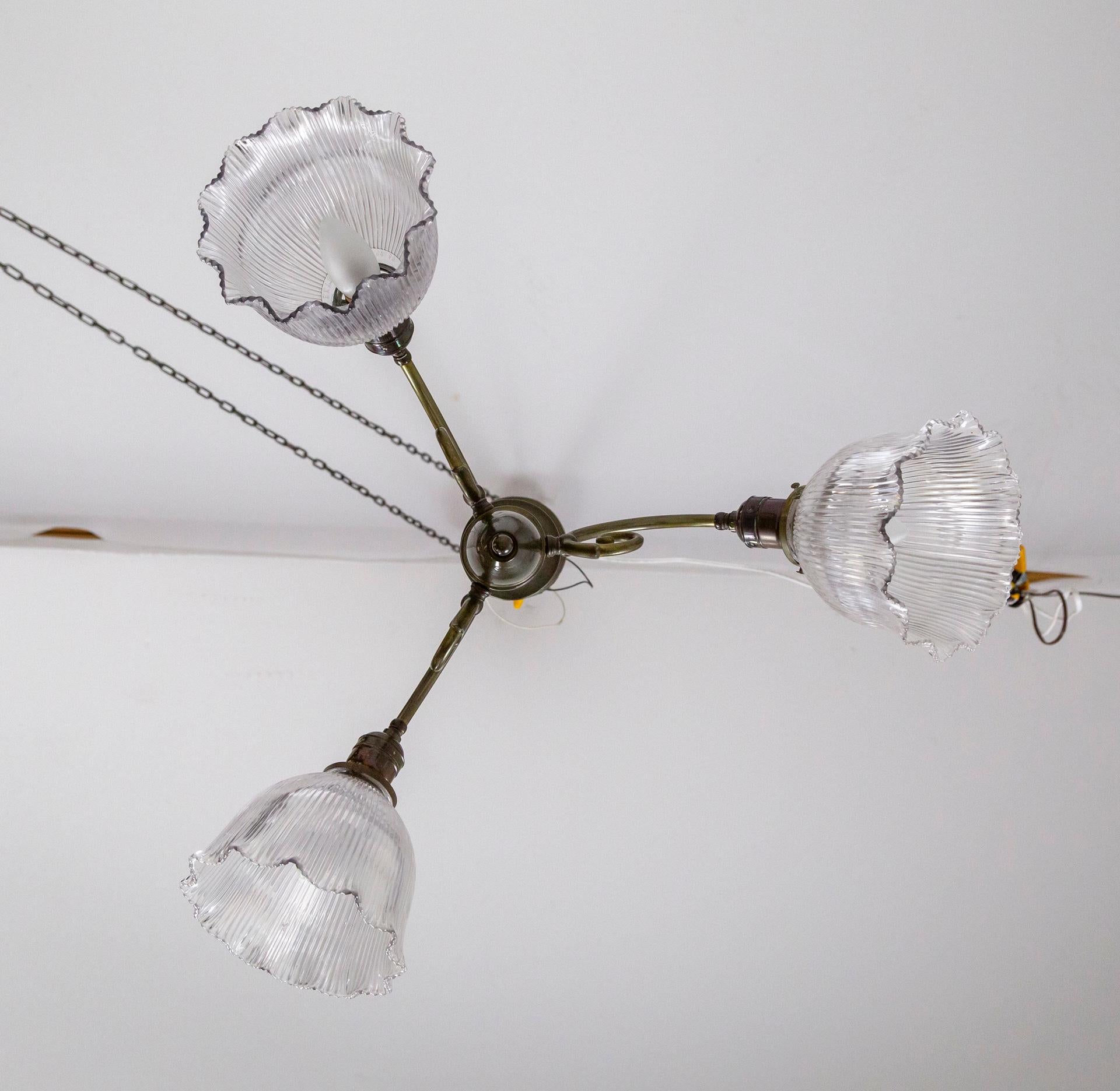 Simple Victorian Brass Chandelier w/ Ruffled Holophane Glass Shades For Sale 1