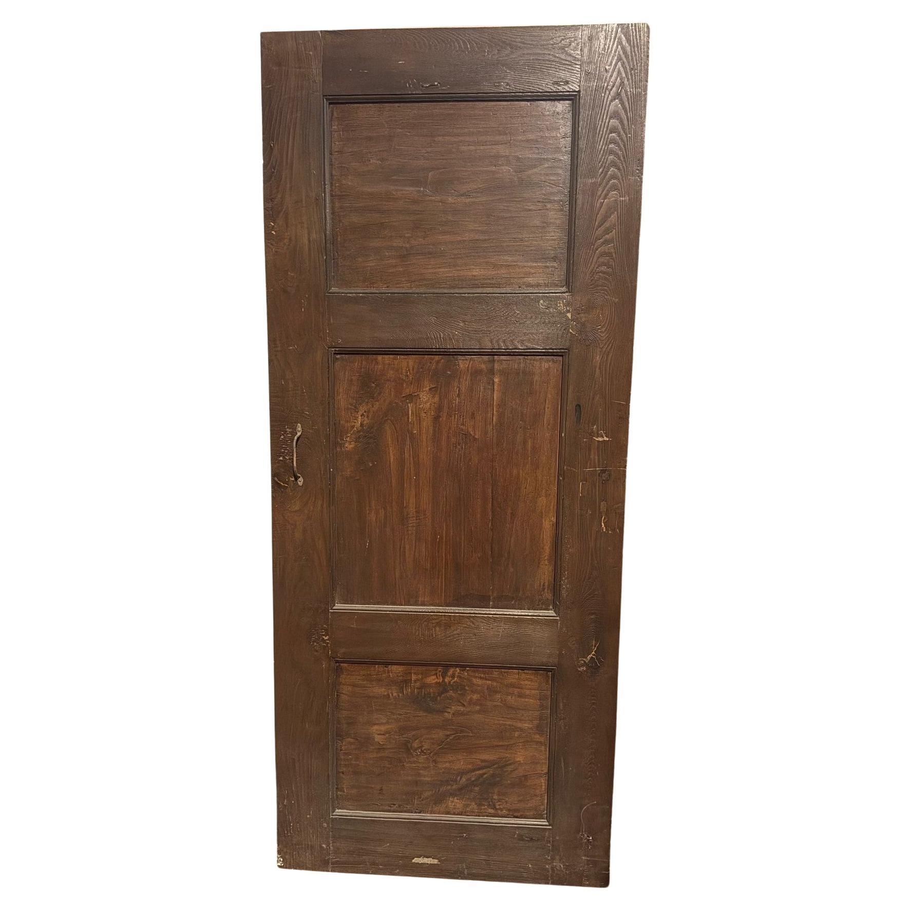 Simple wooden interior door, single leaf carved with squares, Italy