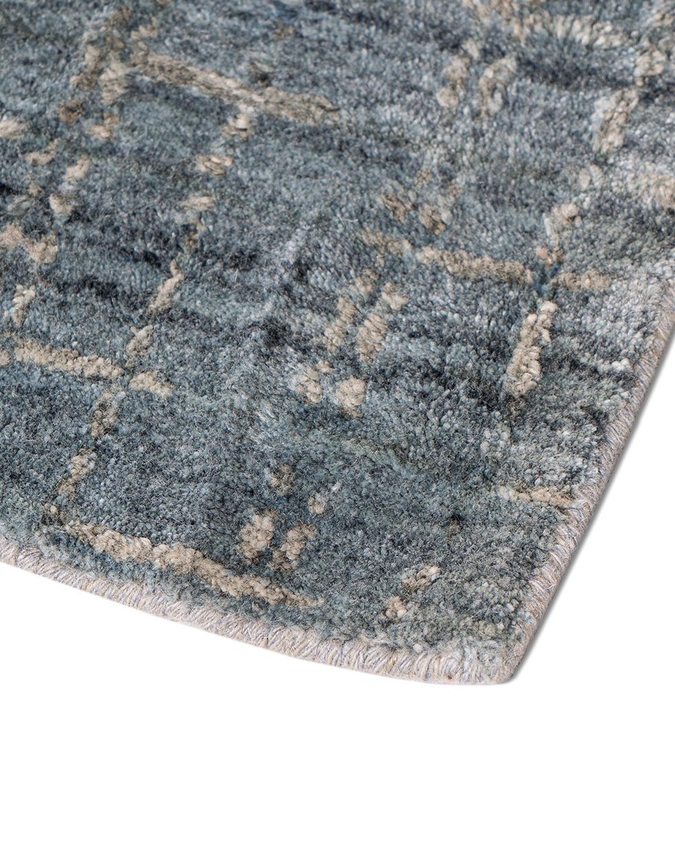 Simplicity Blue Gray Contemporary Rug 8'11 x 12'. We call this our “Simplicity” Line, but a closer look reveals that it is not so simple. Yes, we have eliminated borders, yes the pattern is infinite, yes it is purely geometric. But no, it is not a