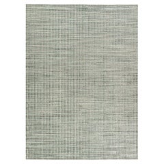 Simplicité et confort du tapis vert sarcelle-argent