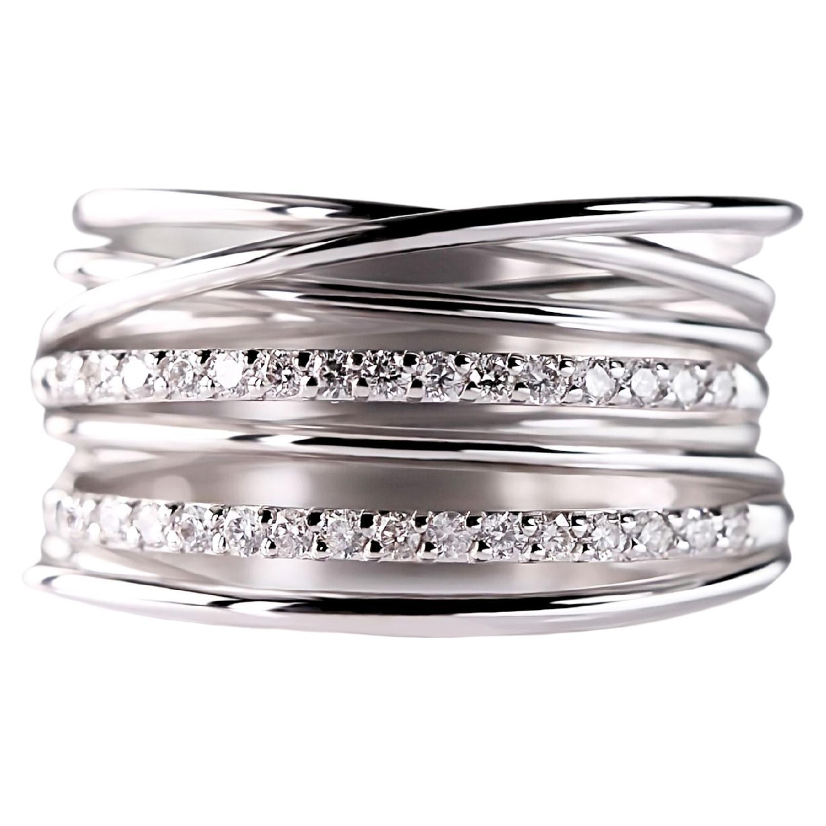 Simplicity in Motion: Abstract 18kt white Gold Ring with Diamonds