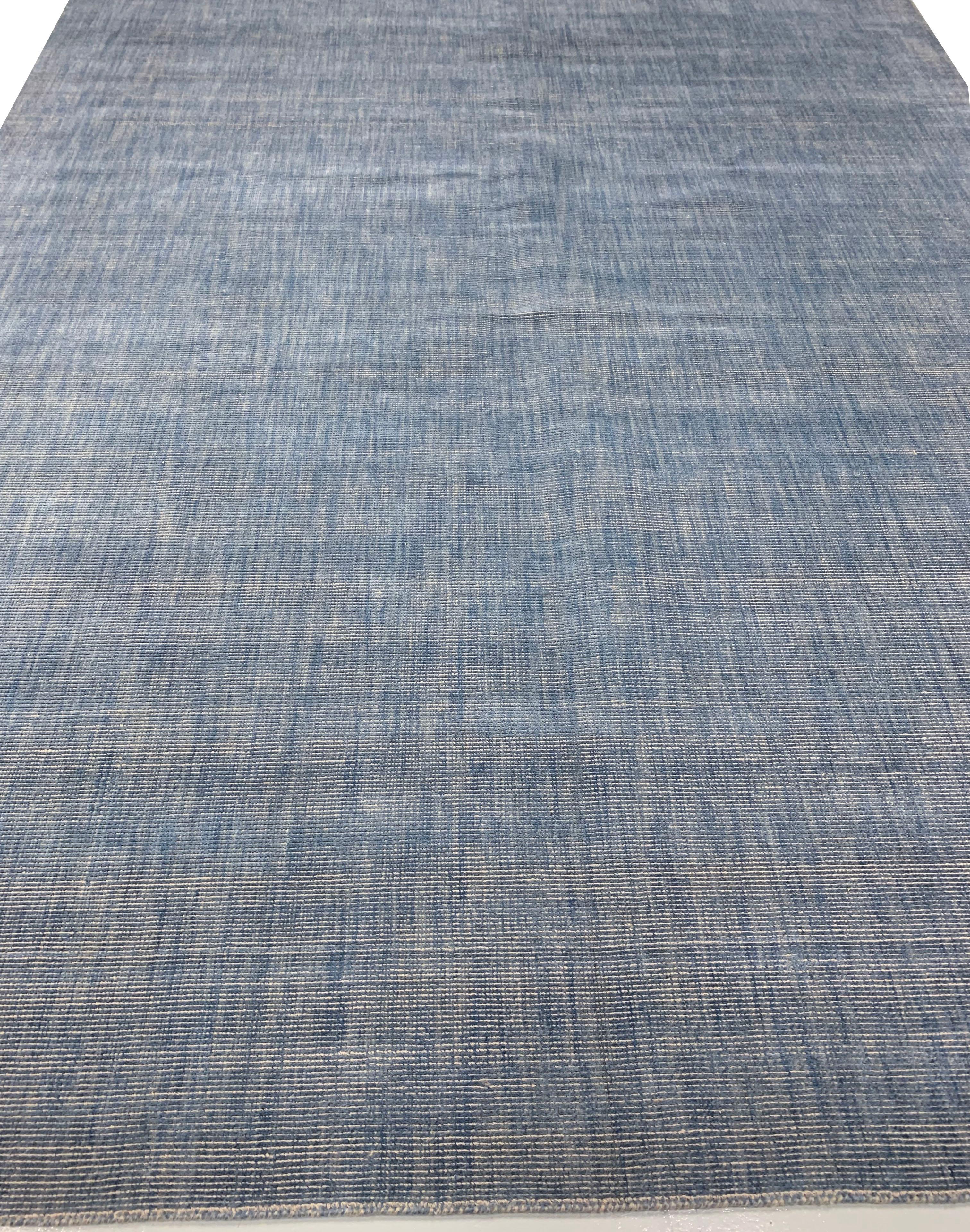 Simplicity blue contemporary area rug 8' x 10'. We call this our “Simplicity” Line, but a closer look reveals that it is not so simple. Yes, we have eliminated borders, yes the pattern is infinite, yes it is purely geometric. But no, it is not a