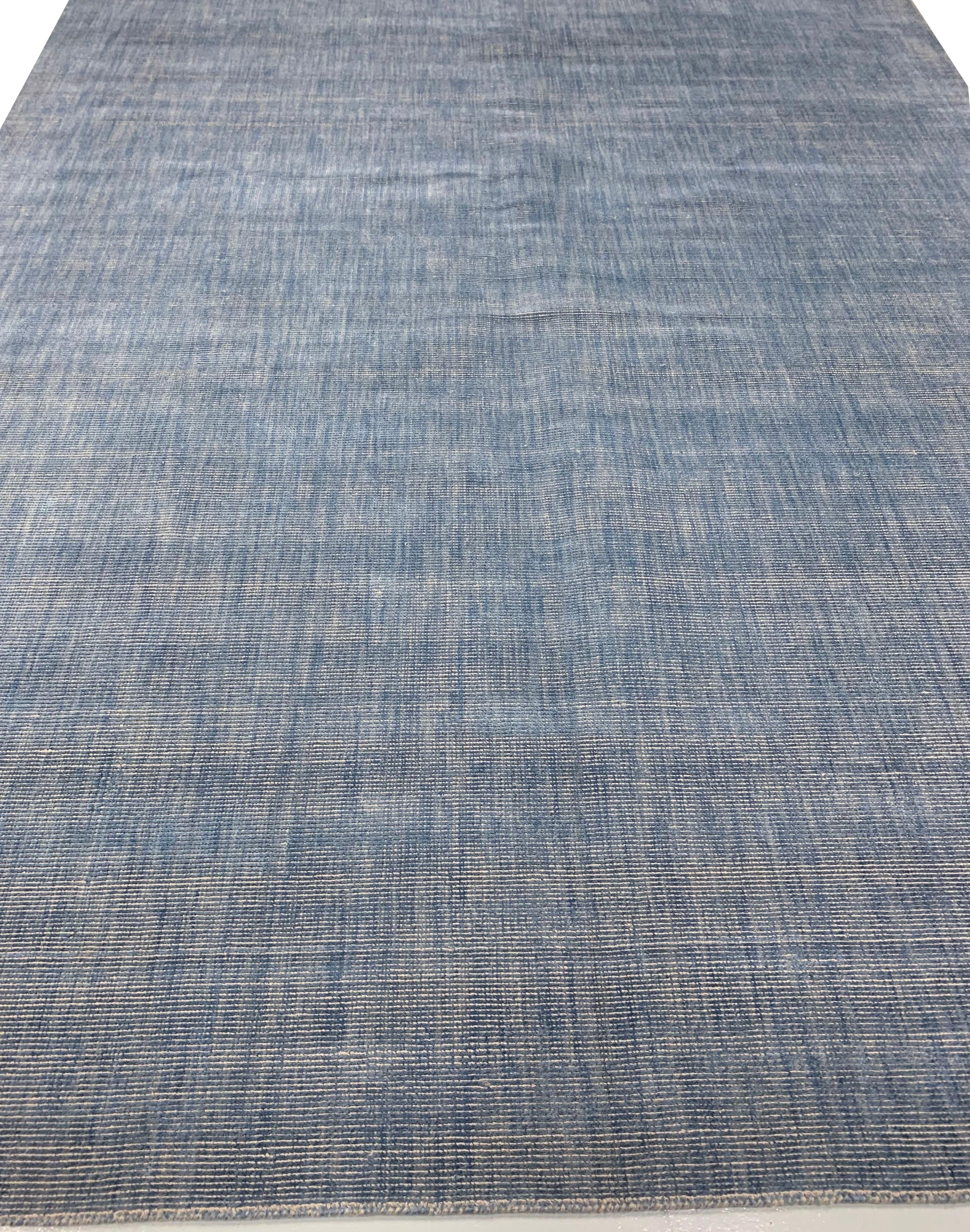 Simplicity blue contemporary rug 8' x 10'. We call this our “Simplicity” Line, but a closer look reveals that it is not so simple. Yes, we have eliminated borders, yes the pattern is infinite, yes it is purely geometric. But no, it is not a simple