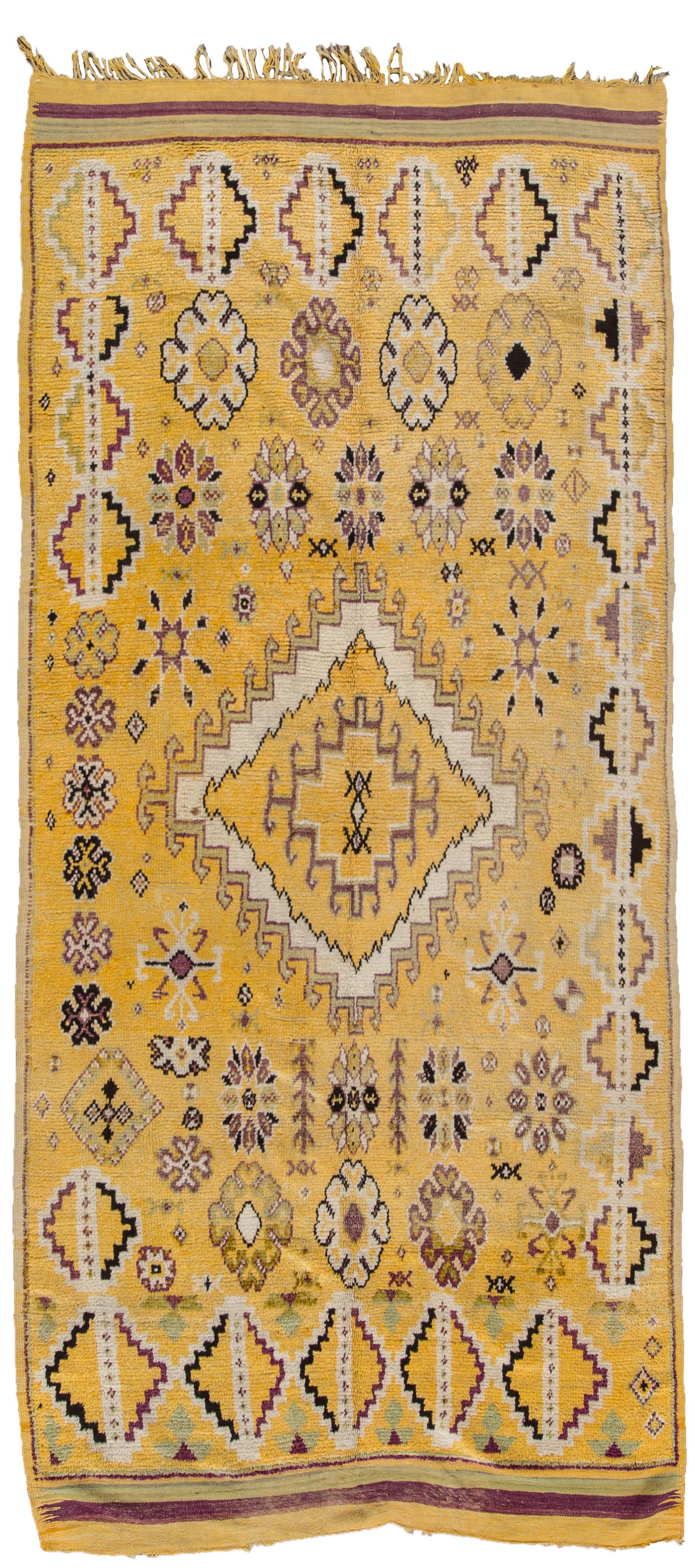 Beautiful Vintage Moroccan Wool rug with a yellow field. Accents of purple, ivory, and green in an all-over geometric design.
 
This rug measures: 5' x 12'
