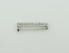 Simply Sweet Diamond Bar Brooch in Platinum and White Gold, Circa 1920's