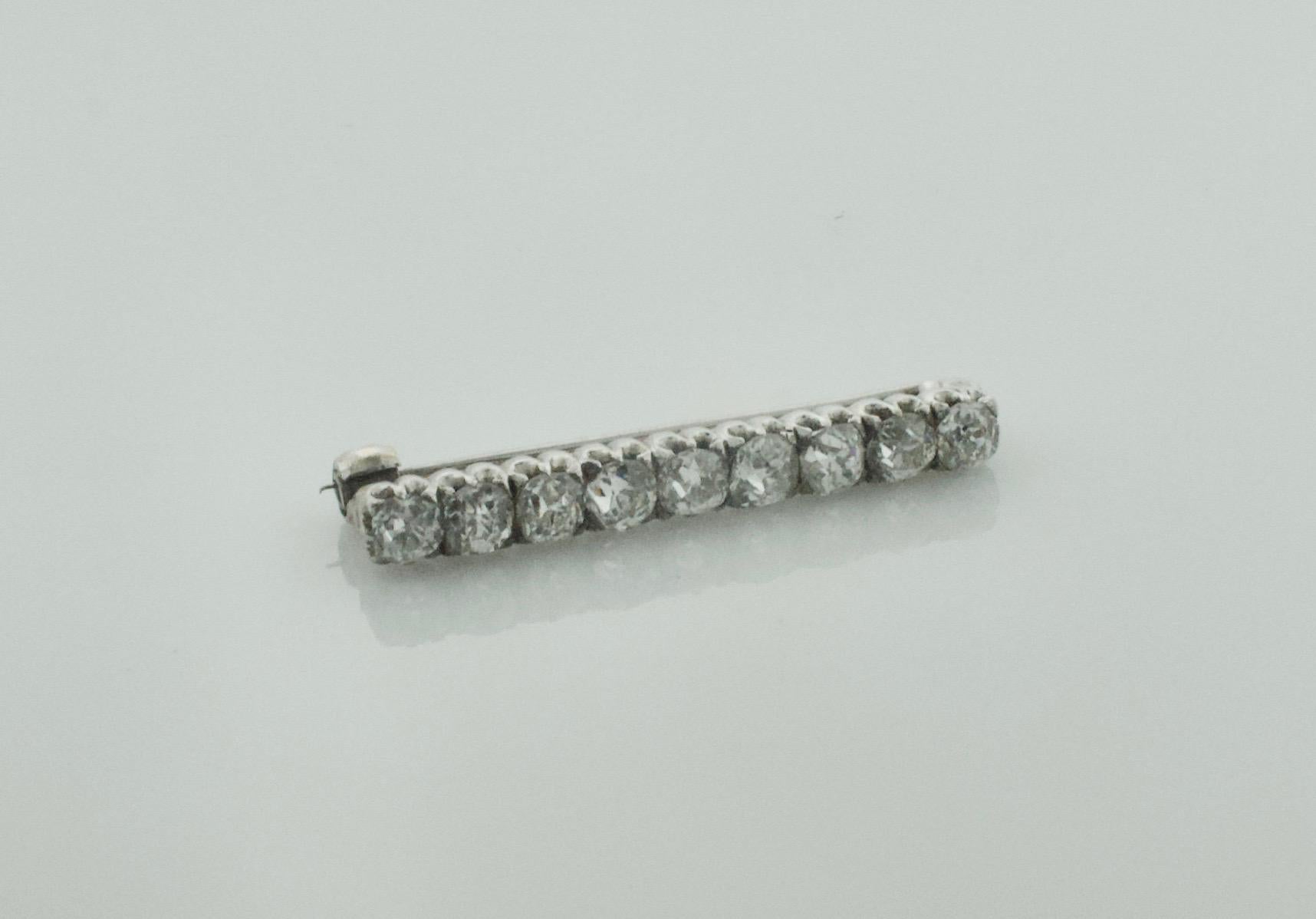 Art Deco Simply Sweet Diamond Bar Brooch in Platinum and White Gold, Circa 1920's For Sale