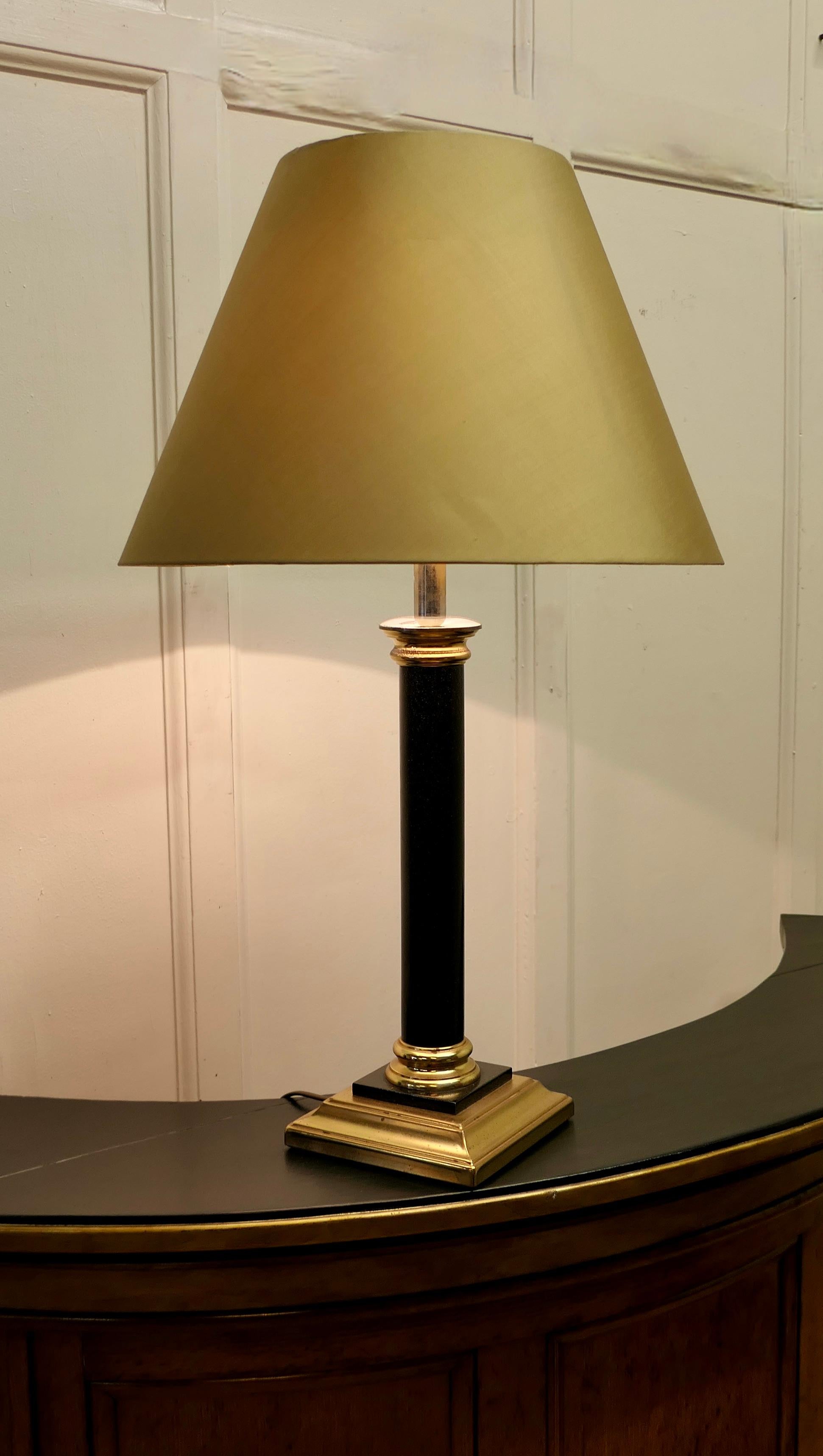Simulated Granite Corinthian Column Brass Table Lamp 

A very pretty piece, the base of the lamp is made in brass and comes with a  Gold linen lampshade
The lamp is all working, the shade is nearly new
The lamp is 31” tall and the base is 7” square,