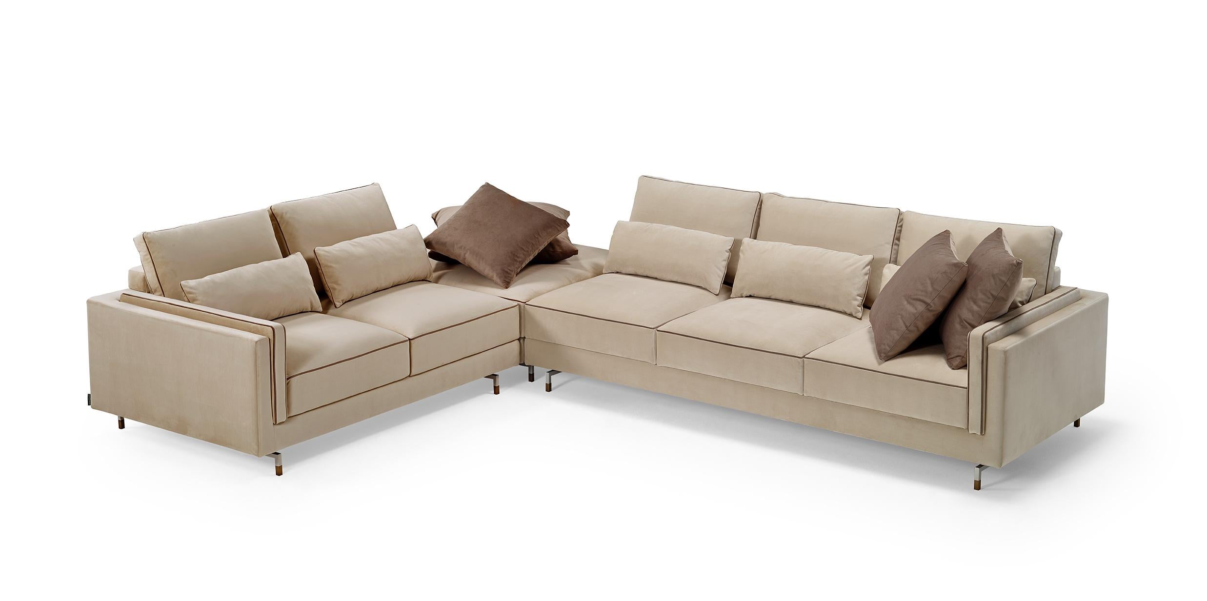 The SINATRA modular seating system is the result of a search for elegance, comfort and versatility combined with each other. The contemporary style design of the Sinatra sofa is characterized by a seamless contrast piping detail that defines its