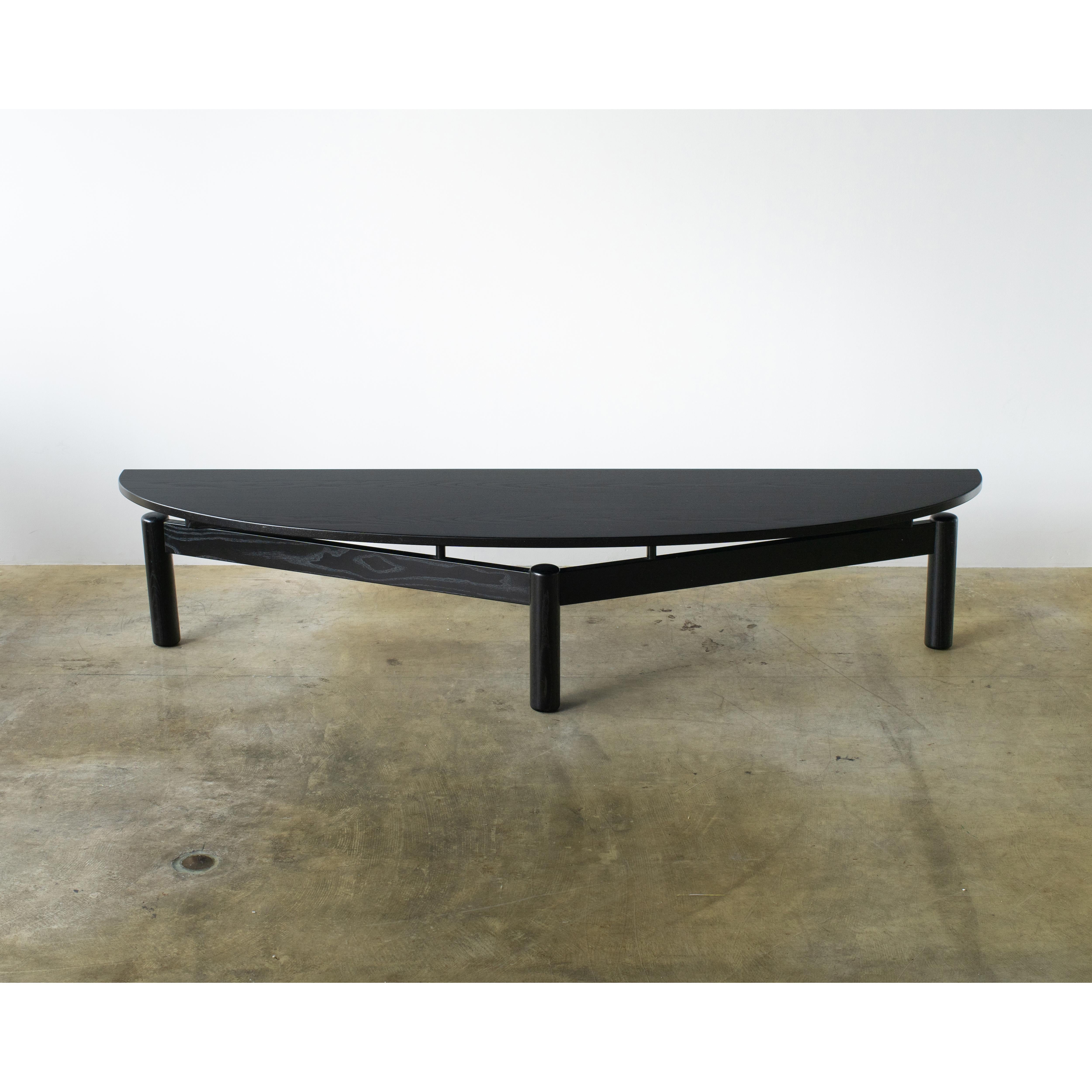 Sindbad coffee table
Designed by Vico Magistretti for Cassina. Half oval shaped table designed for center table. Used as low console table put in front of the wall. Probably it can be used as TV side board.
Made of wood, black painted.