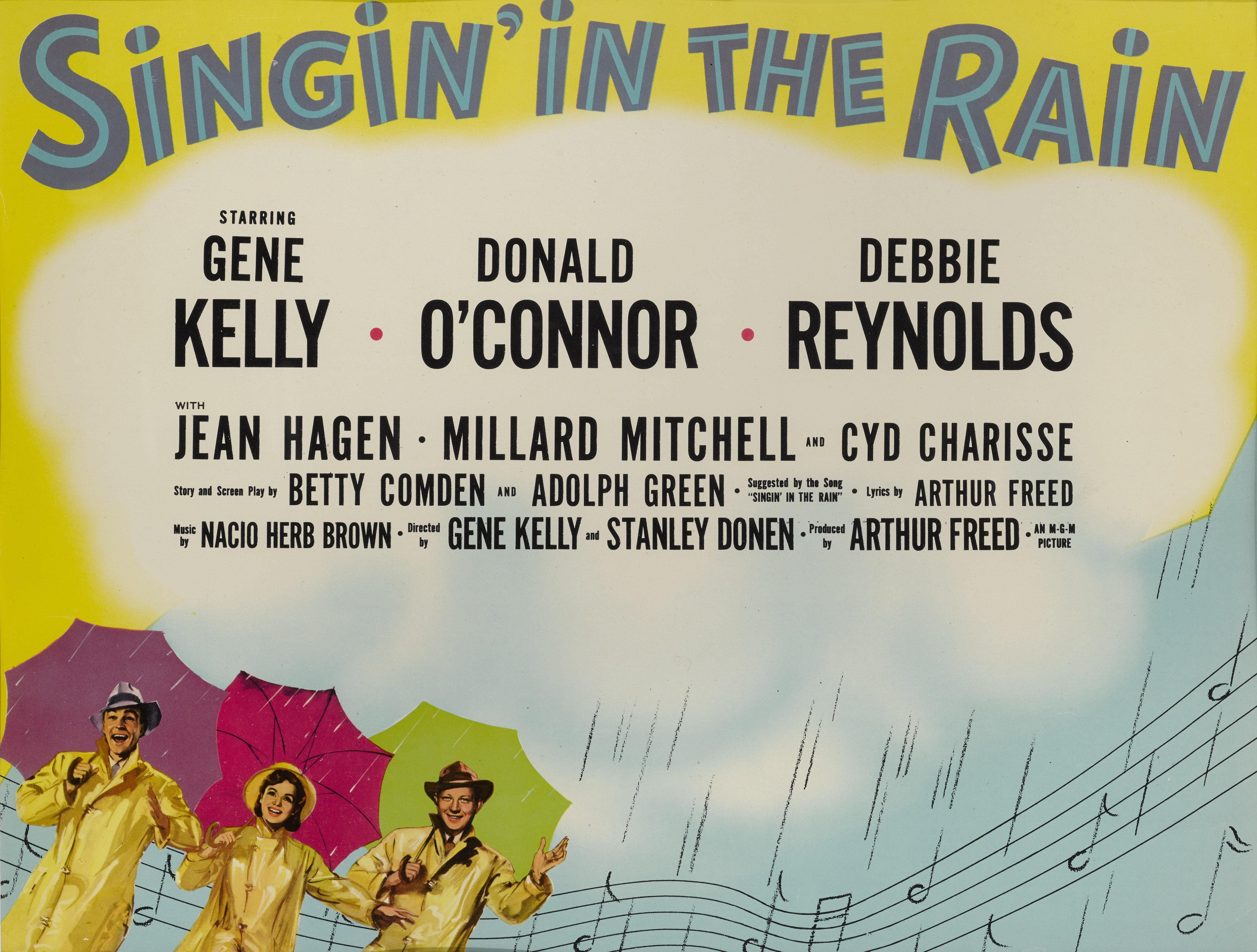 Original US-Titel-Lobbykarte für das klassische Musical von 1952.
Die romantische Musical-Komödie wurde von Gene Kelly und Stanley Donen inszeniert und choreographiert. In den Hauptrollen sind außerdem Kelly, Donald O'Connor und Debbie Reynolds zu