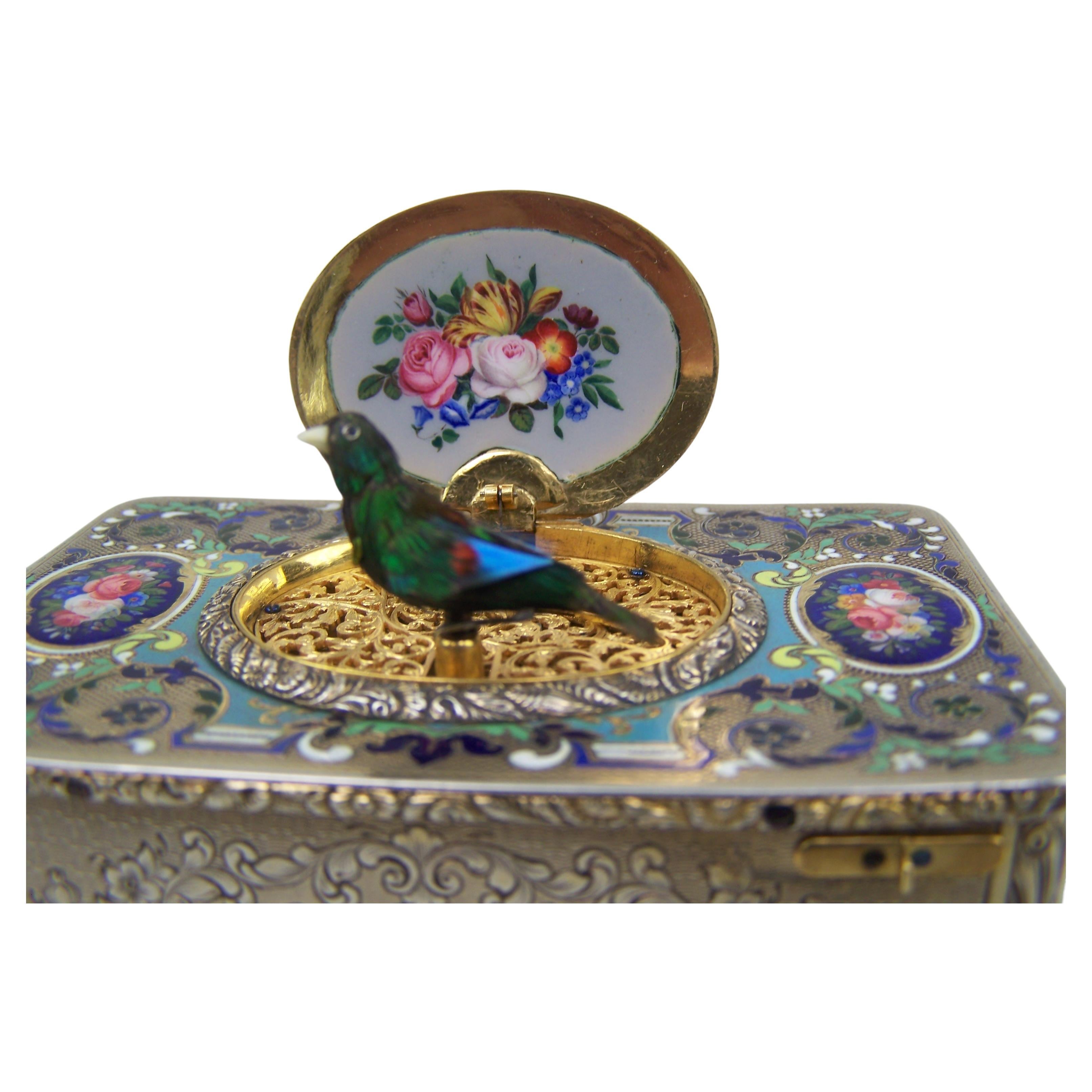 Singing bird box by Bruguier in silver case with enamel to top and lid For Sale