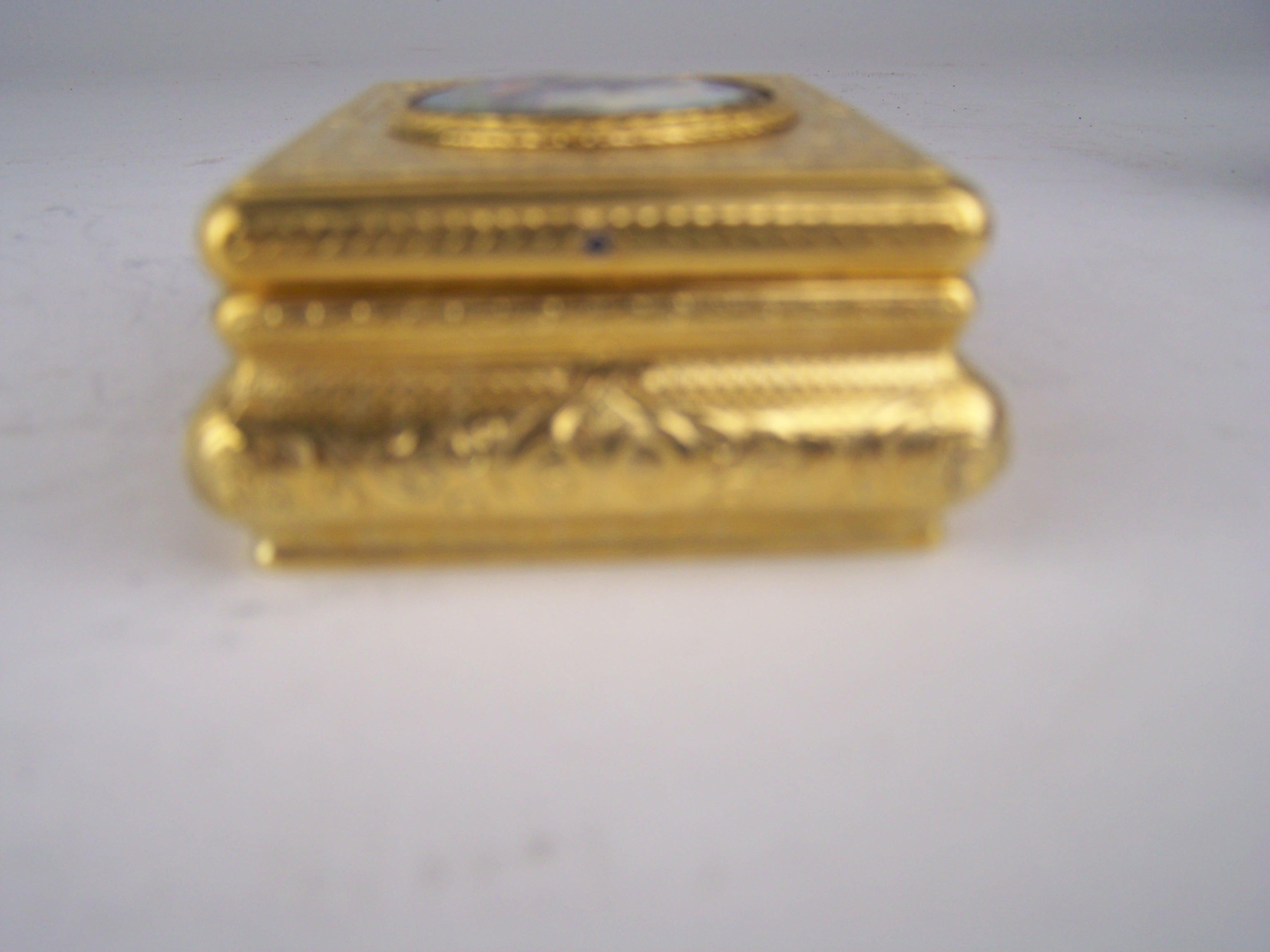 Engraved Singing bird box by Bruguier in guilded case with enameled  lid For Sale