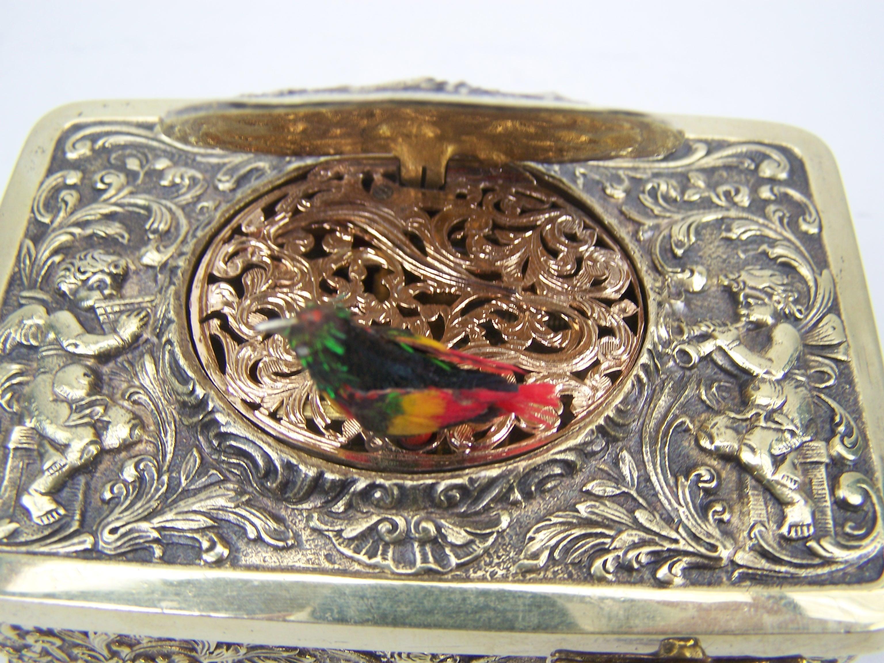 Singing bird box by K Griesbaum in guilded case 8