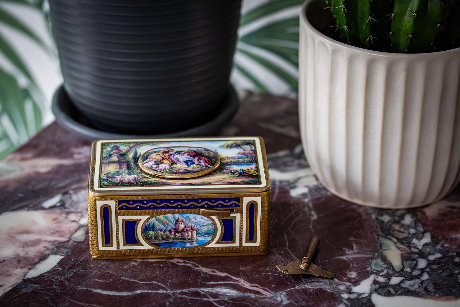 Video audio removed by 1st Dibs, original audio version available please contact us. 

Featuring Enamelled Decoration Signed on the Movement Circa 1930

Singing Bird Music Box. The music box of rectangular form extensively decorated in enamel with a