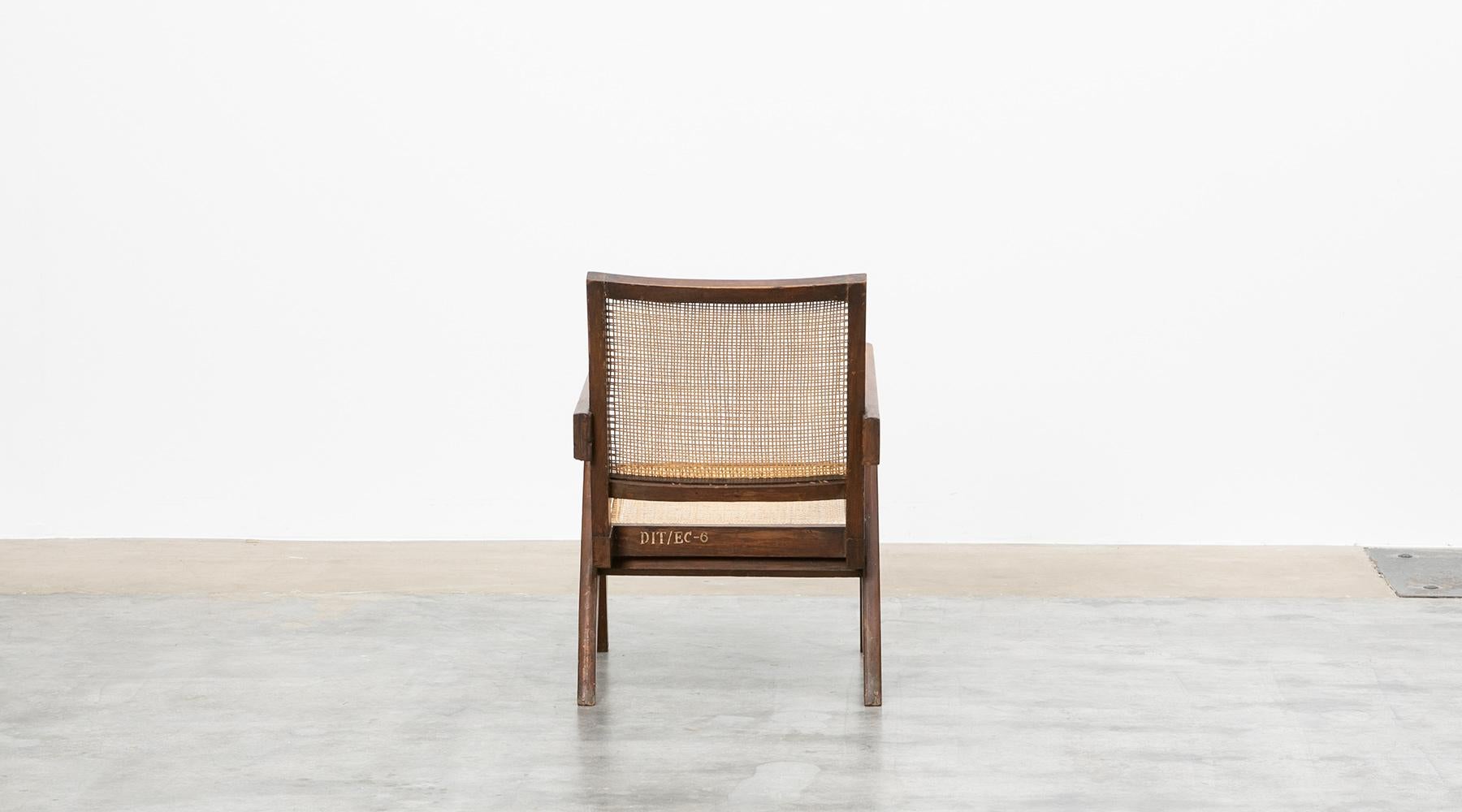 teak and cane chair