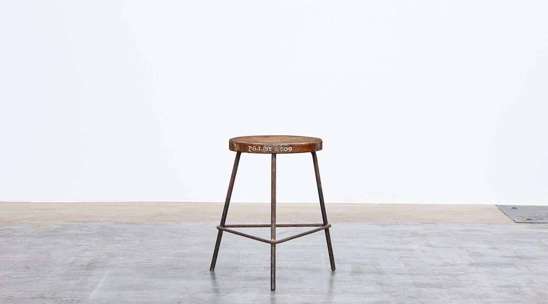 Stool designed by Pierre Jeanneret, wood and metal, Chandigarh, India, 1955.

An original stool by Pierre Jeanneret from 1960. The wooden seat is marked on the side and comes on a three-legged metal construction. The stool definitely lives through