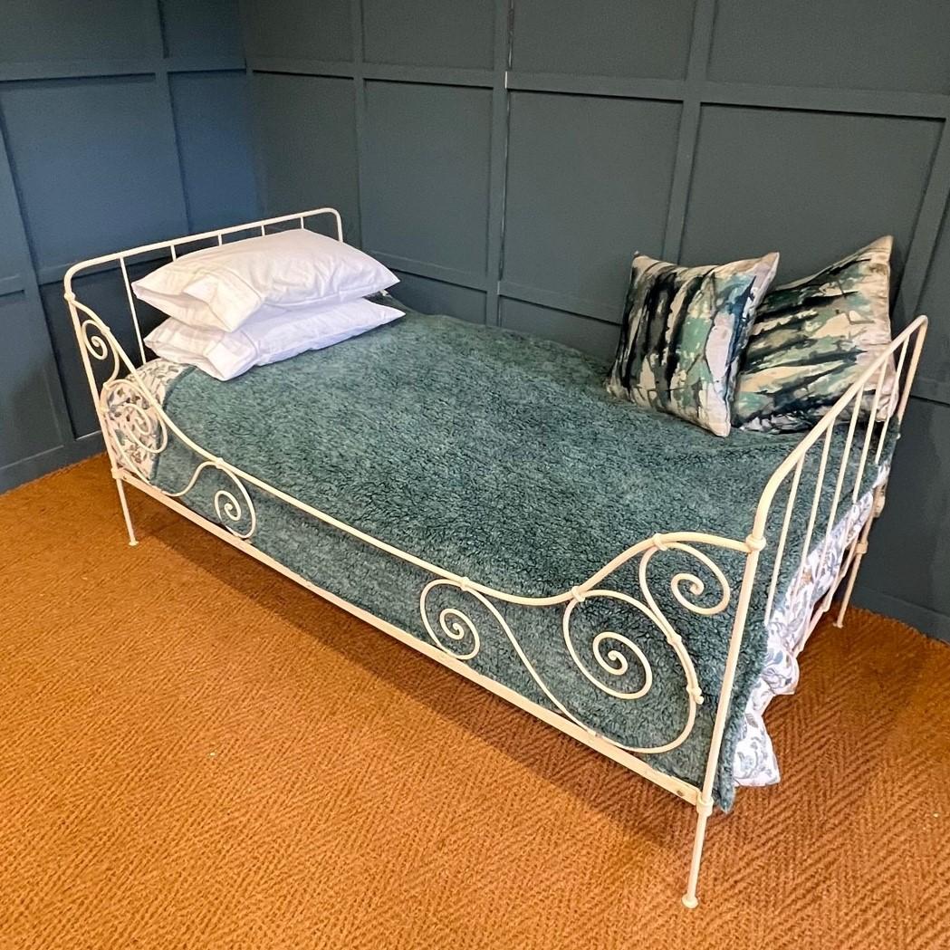 This antique classic day bed originates from France and probably dates around the 1900’s. It has decorative scroll detailing and folds flat for transportation. It measures some 3’6 and would be ideal as a spare bed/sofa in a room that needs to be