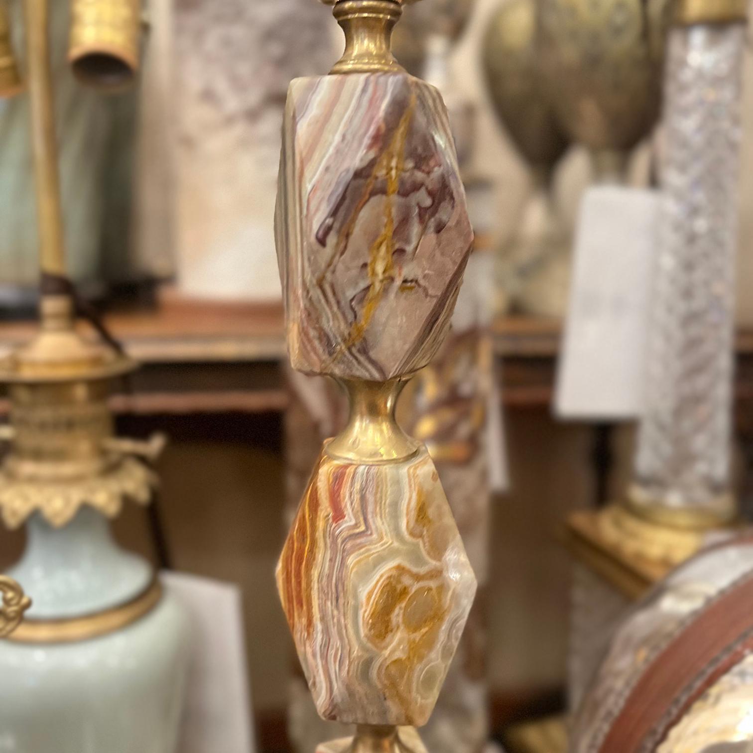 A circa 1920’s French agate stone table lamp with gilt bronze elements.

Measurements:
Height of body: 19