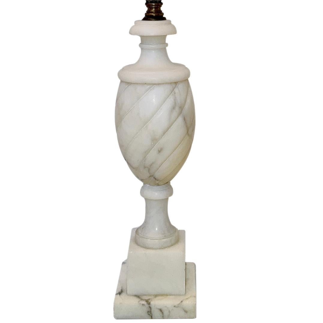 A circa 1950's Italian alabaster lamp.

Measurements:
Height of body: 14