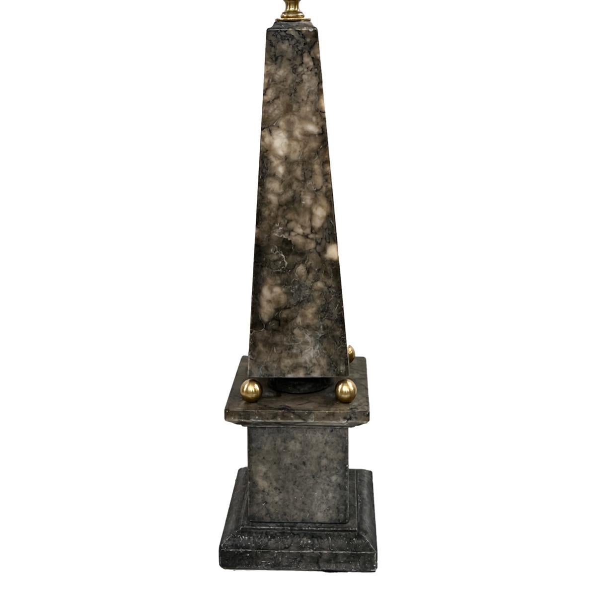A single circa 1940's French obelisk shaped alabaster lamp.

Measurements:
Height of body: 18