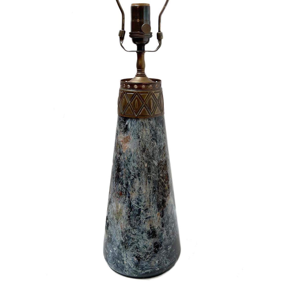 A circa 1900 French art glass oil lamp converted to electric with bronze detailing.

Measurements:
Height of body: 14.5